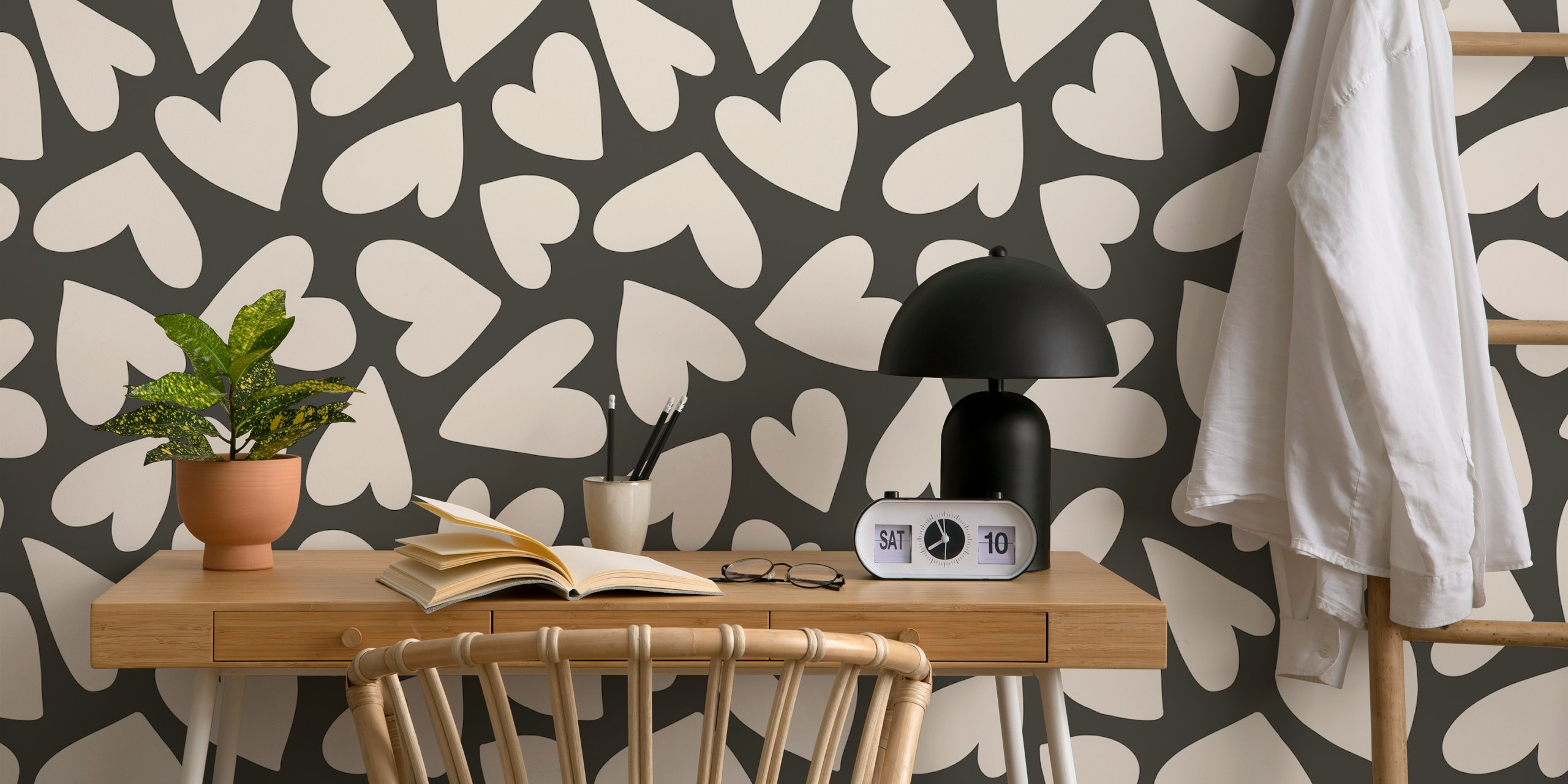 Heart shapes in cream on a dark gray background wallpaper