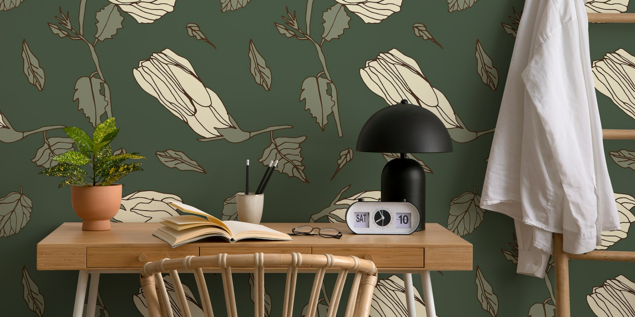Beige floral design on deep green background wallpaper