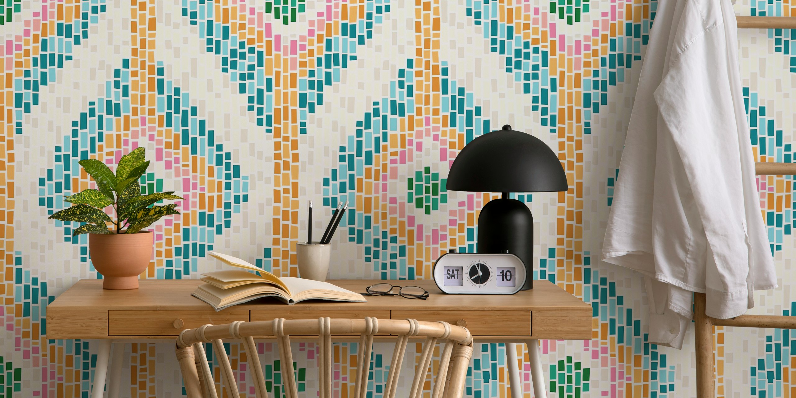 Colorful diamond tile pattern in blue, pink, and orange wallpaper