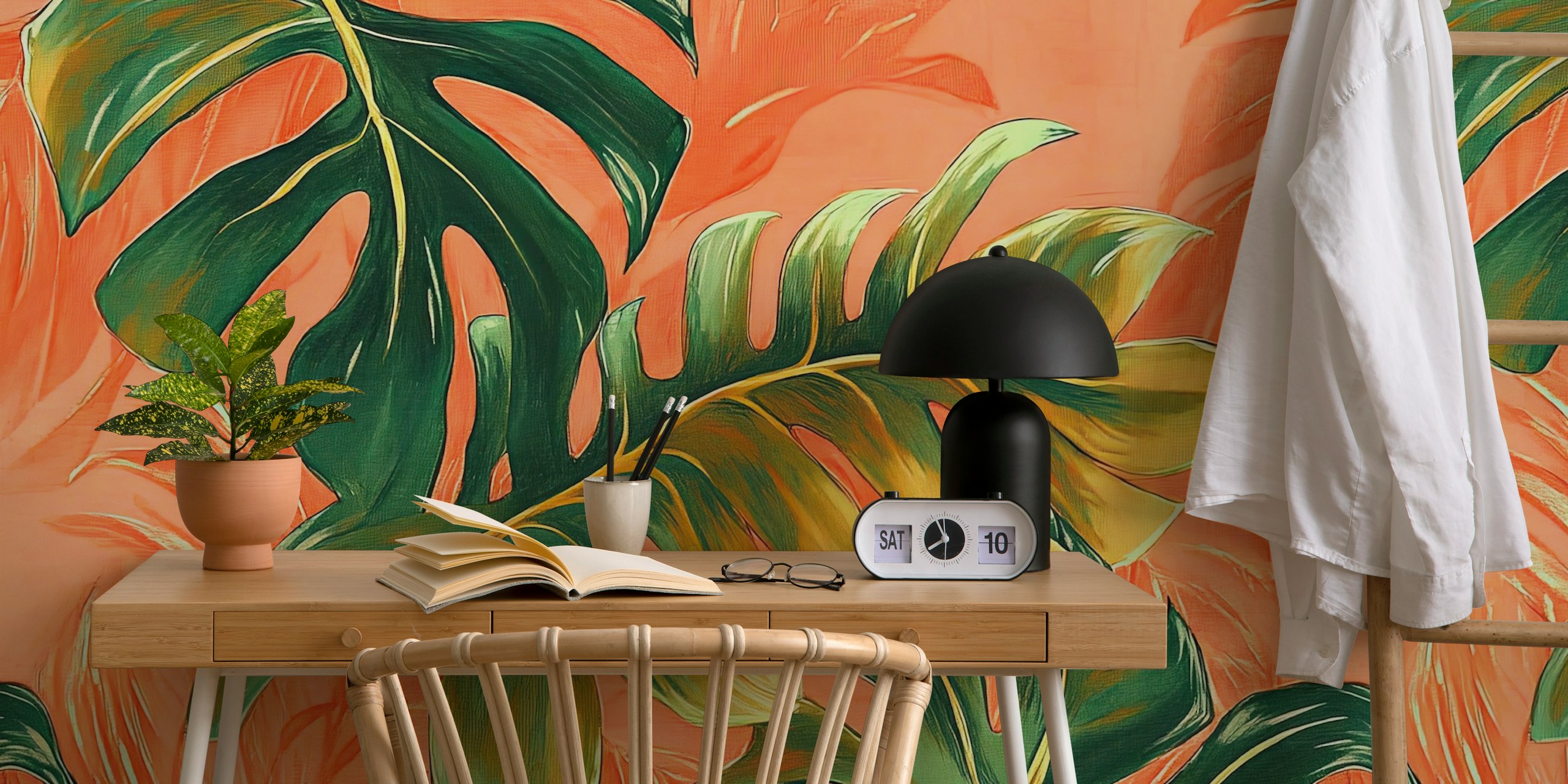 Monstera Peach wallpaper in a room setting.