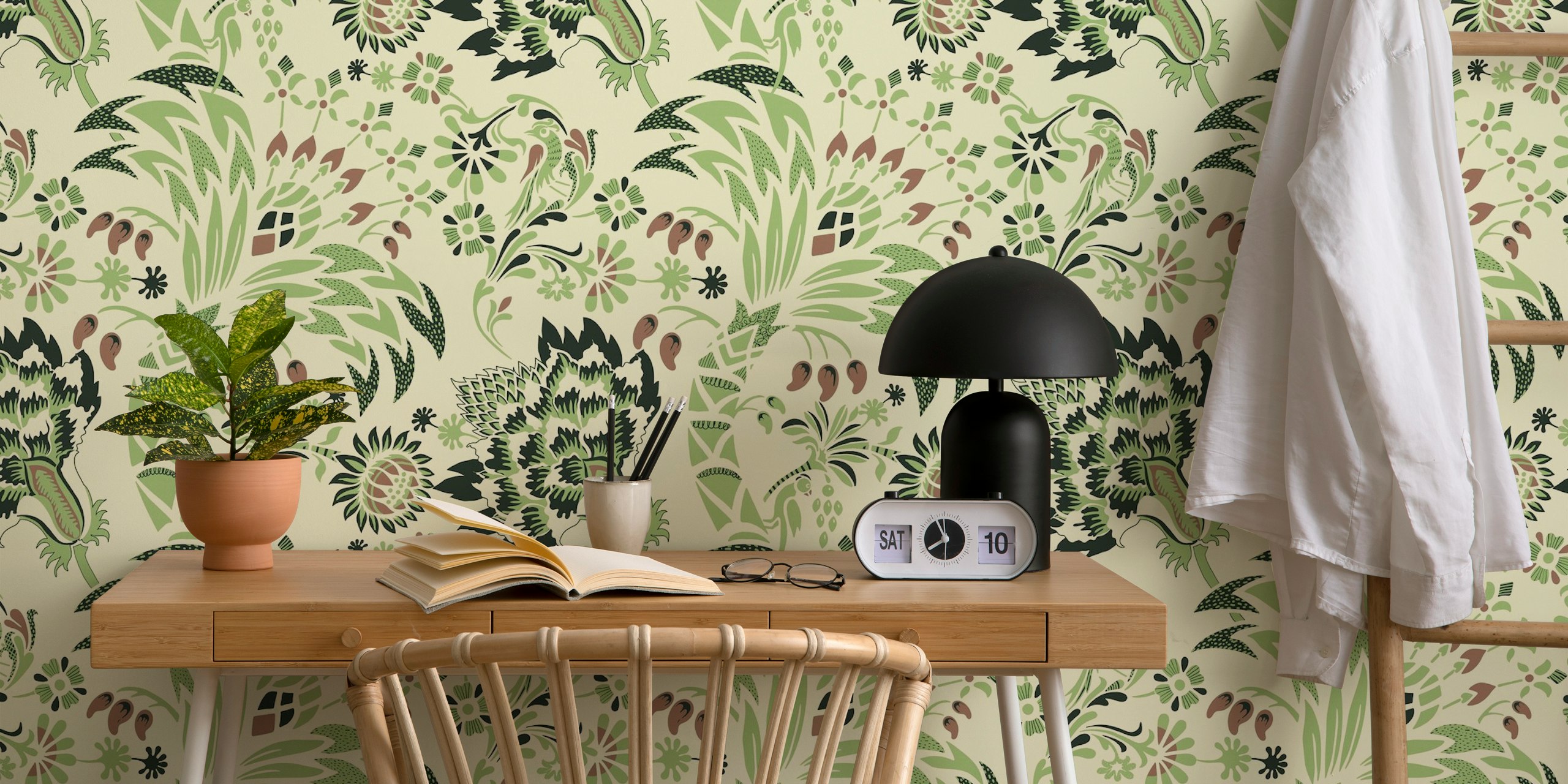 Botanical floral patterns in green and brown on cream wallpaper
