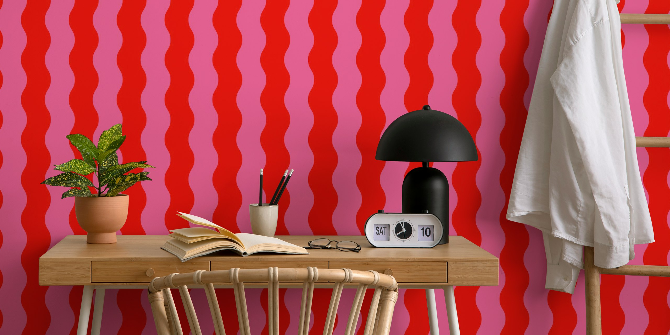 Wavy pink and red stripes wallpaper in a room