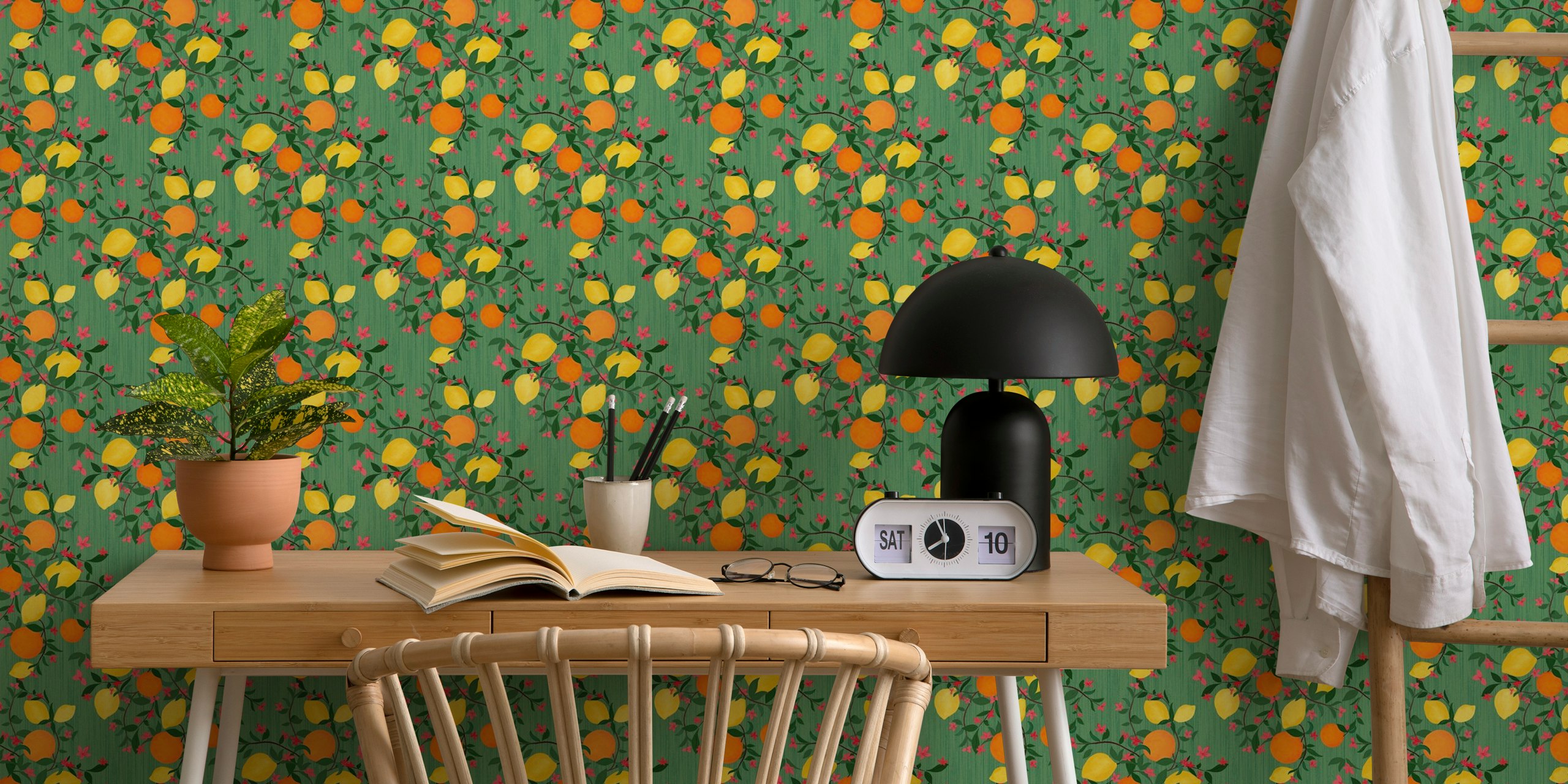 Citrus fruits and pink flowers pattern on green background wallpaper