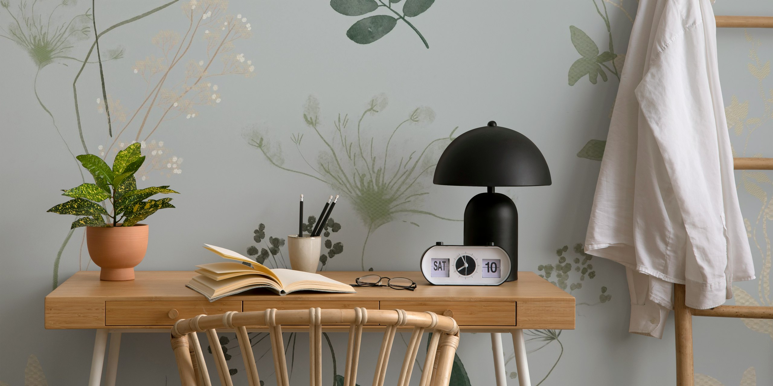 Botanical green leaves and flowers on soft gray wallpaper