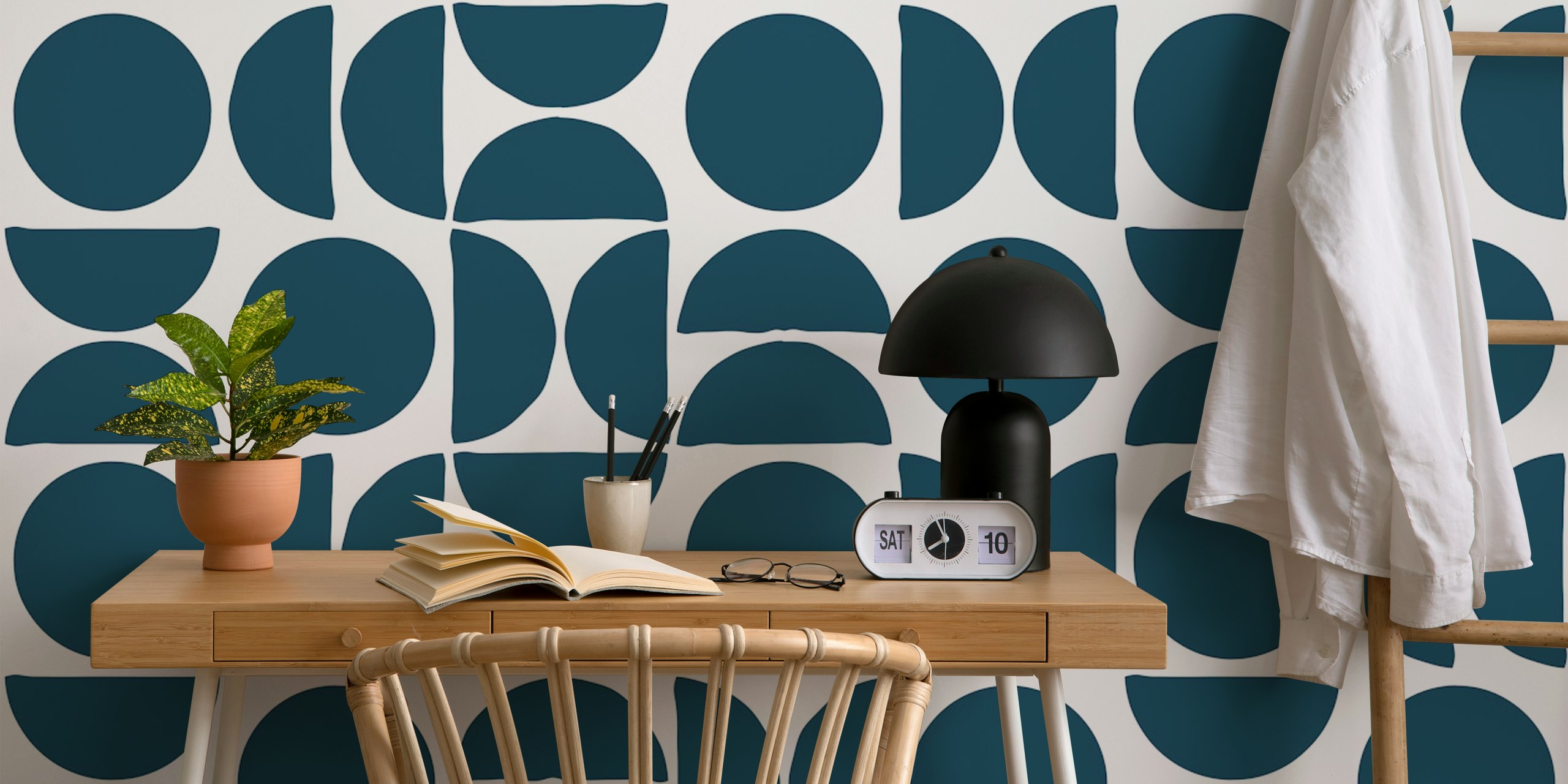 Geometric circle design in petrol blue and white wallpaper