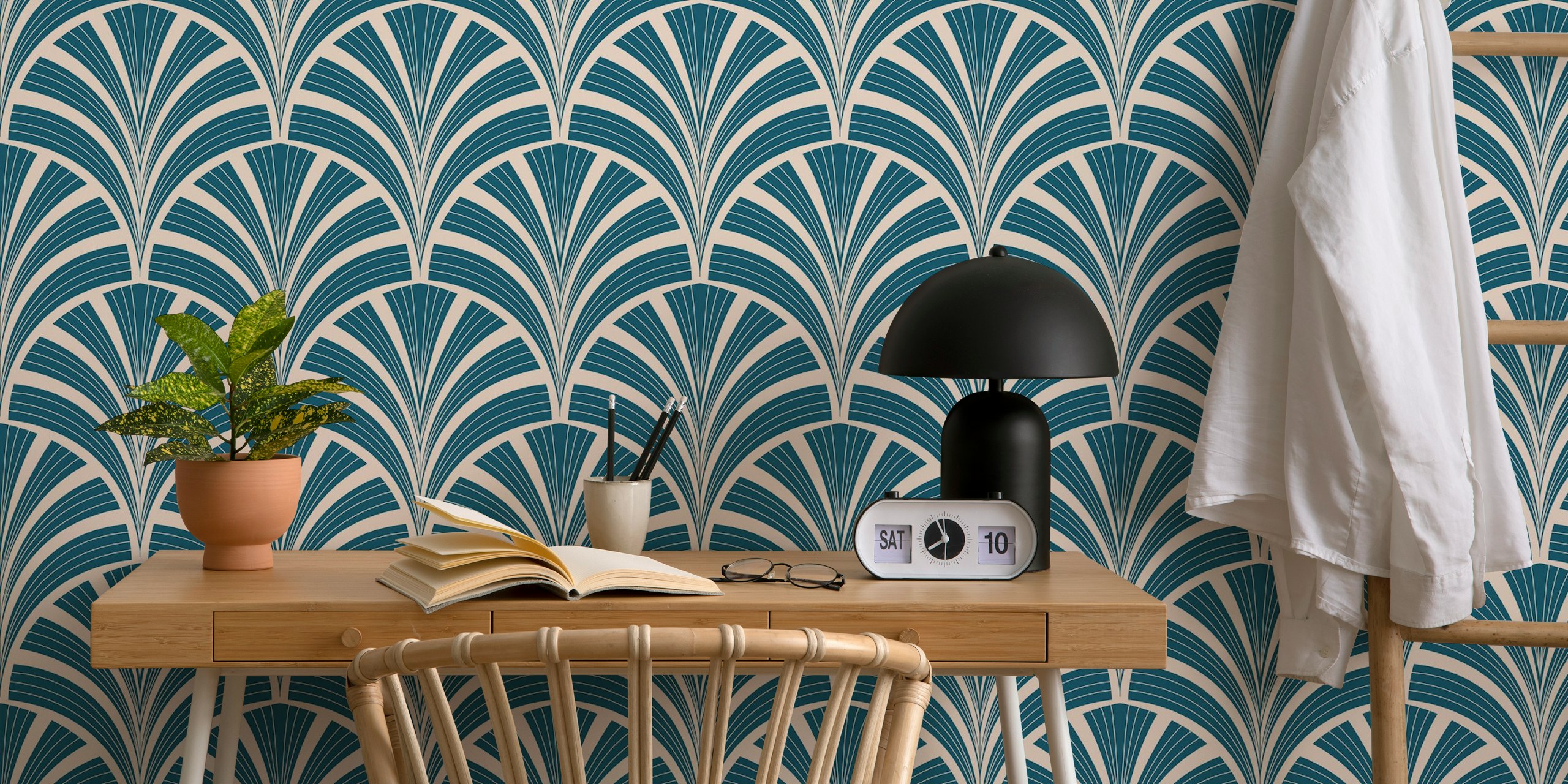 Art Deco palm frond design in peacock blue and blush pink wallpaper