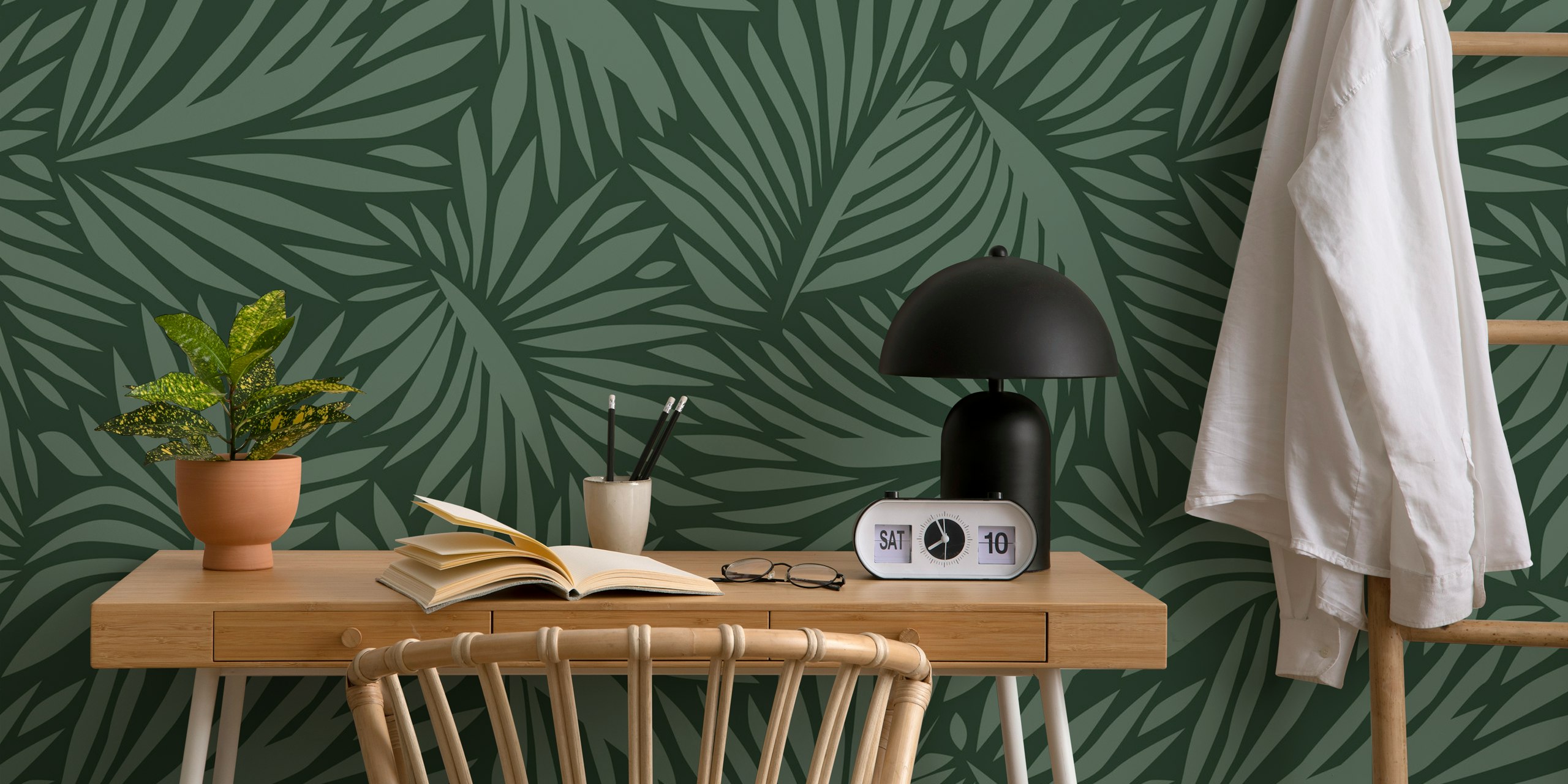 Tropical leaf pattern in dark green tones wallpaper
