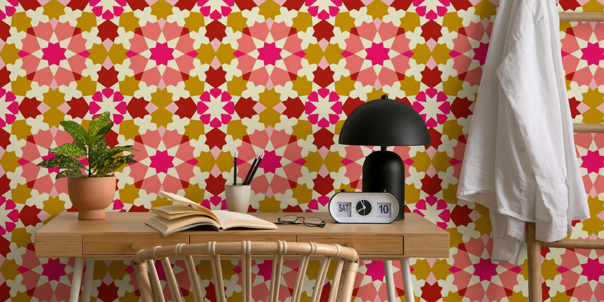 Colorful star-shaped patterns in pink, cream, and brown wallpaper