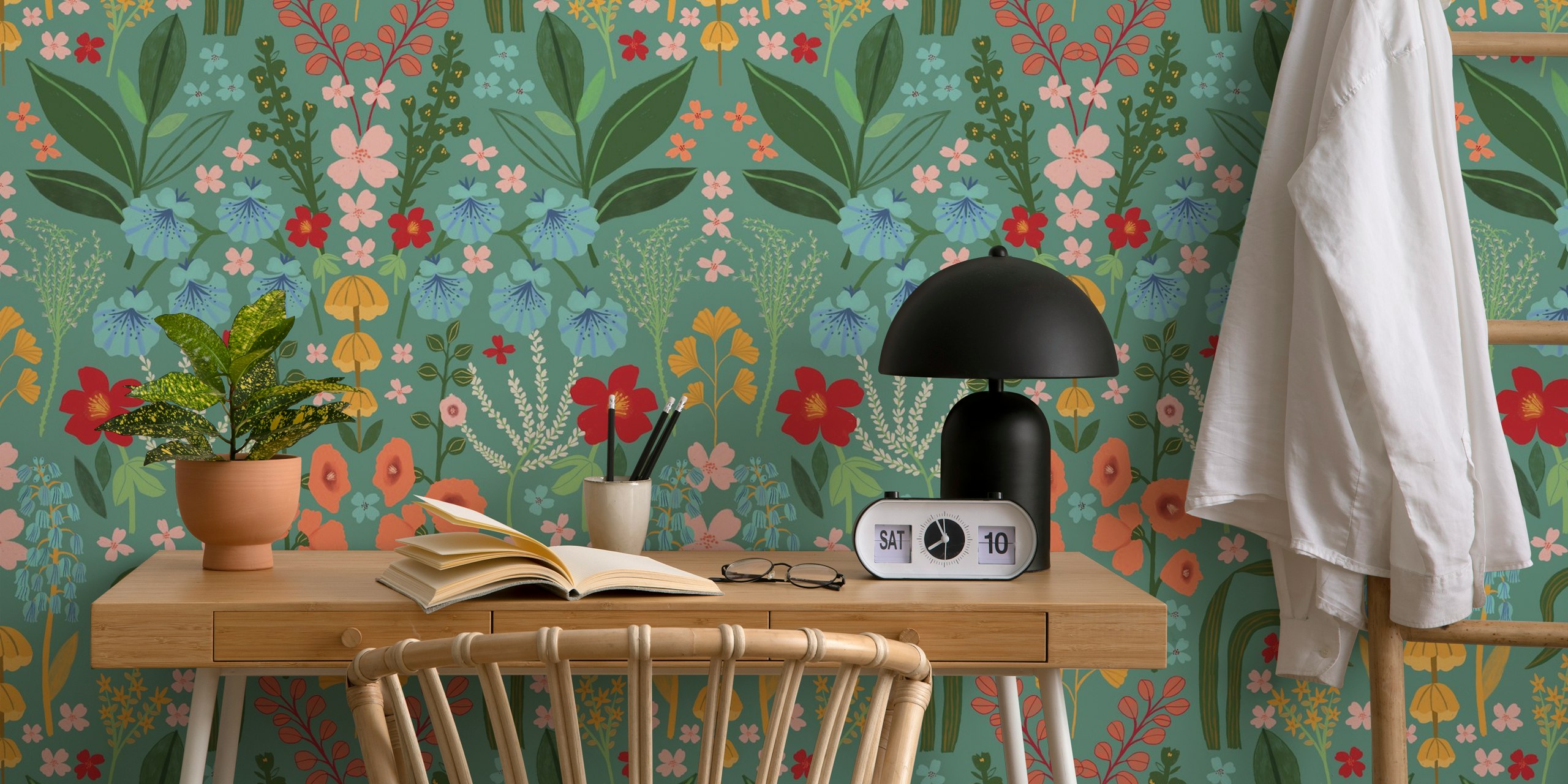 Colorful floral pattern with bluebells, pink flowers, and green leaves wallpaper