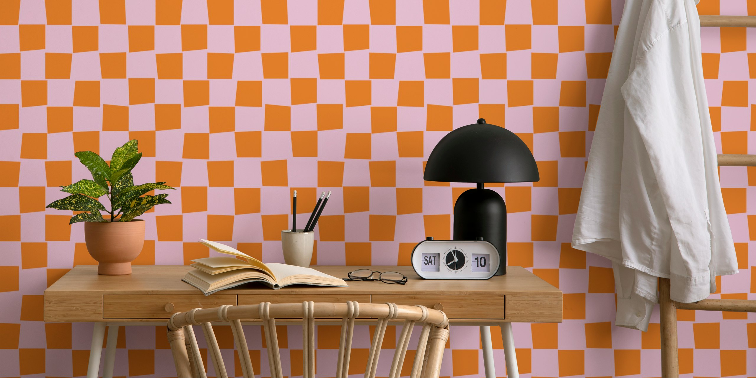 Checkerboard pattern wallpaper in orange and pink colors with playful design