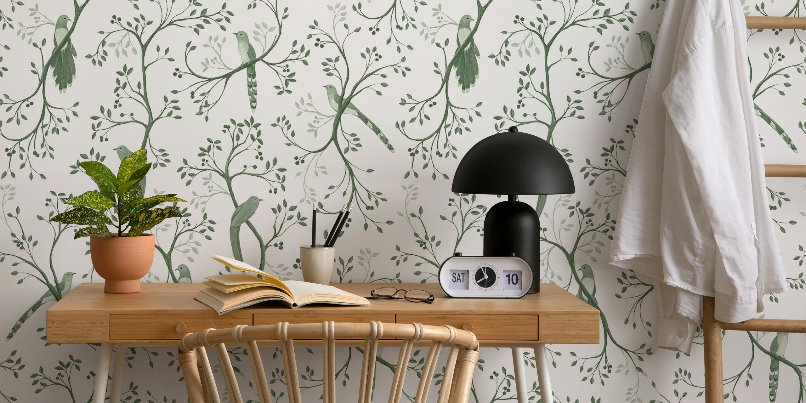 Green birds perched on ivory branches with leaves wallpaper
