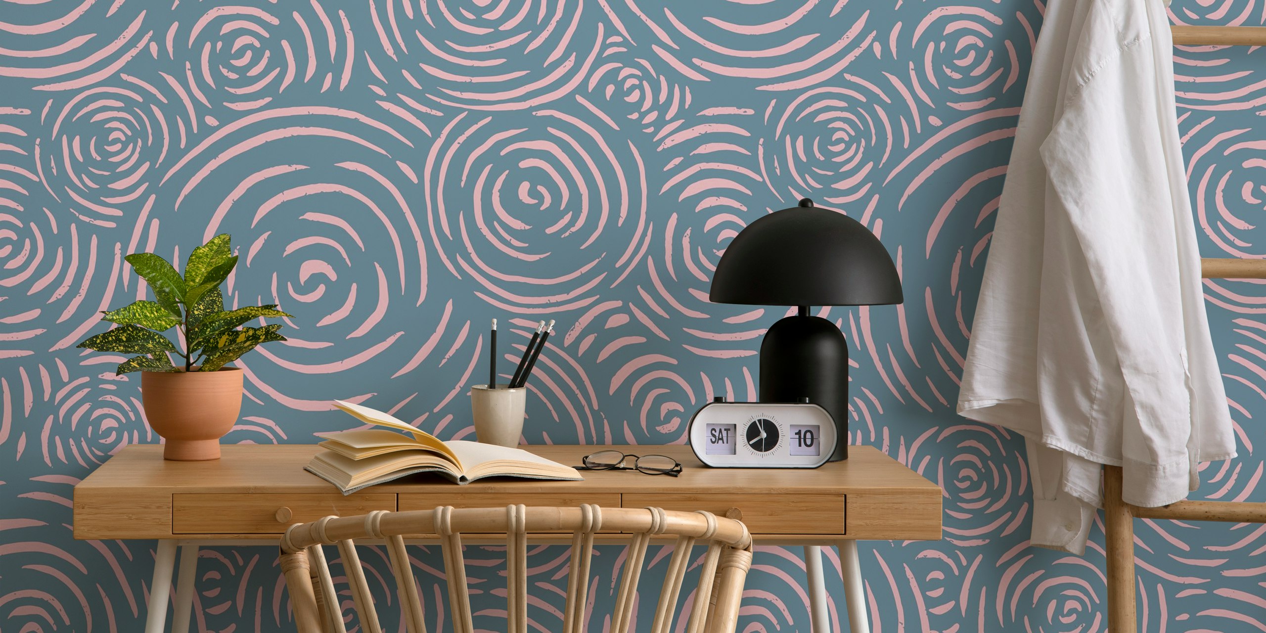 Blue and pink patterned wallpaper in a room