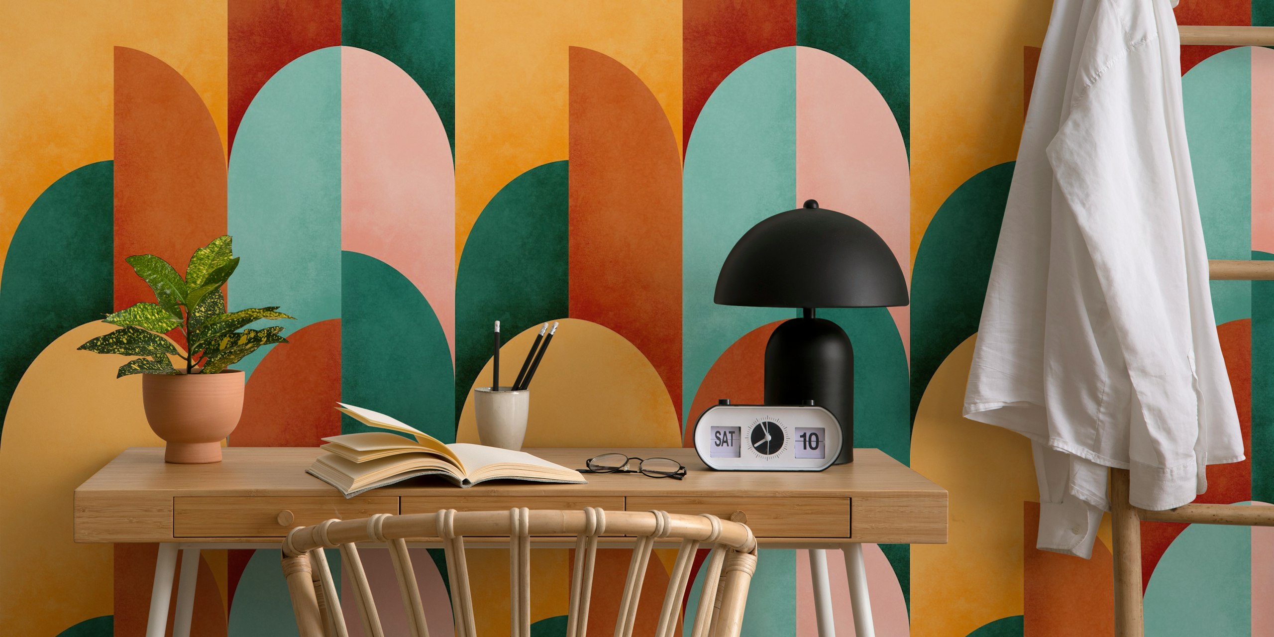 Mid century modern geometric wallpaper in orange, teal, and pink tones