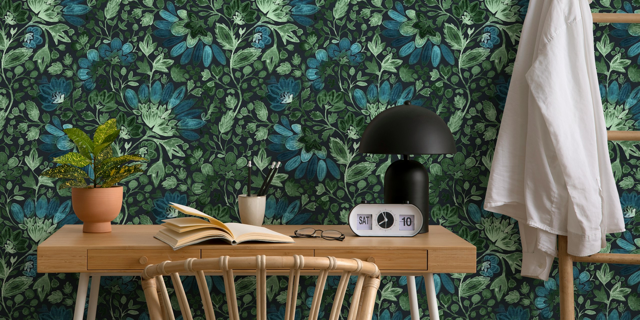 Emerald green and blue floral pattern on dark background wallpaper