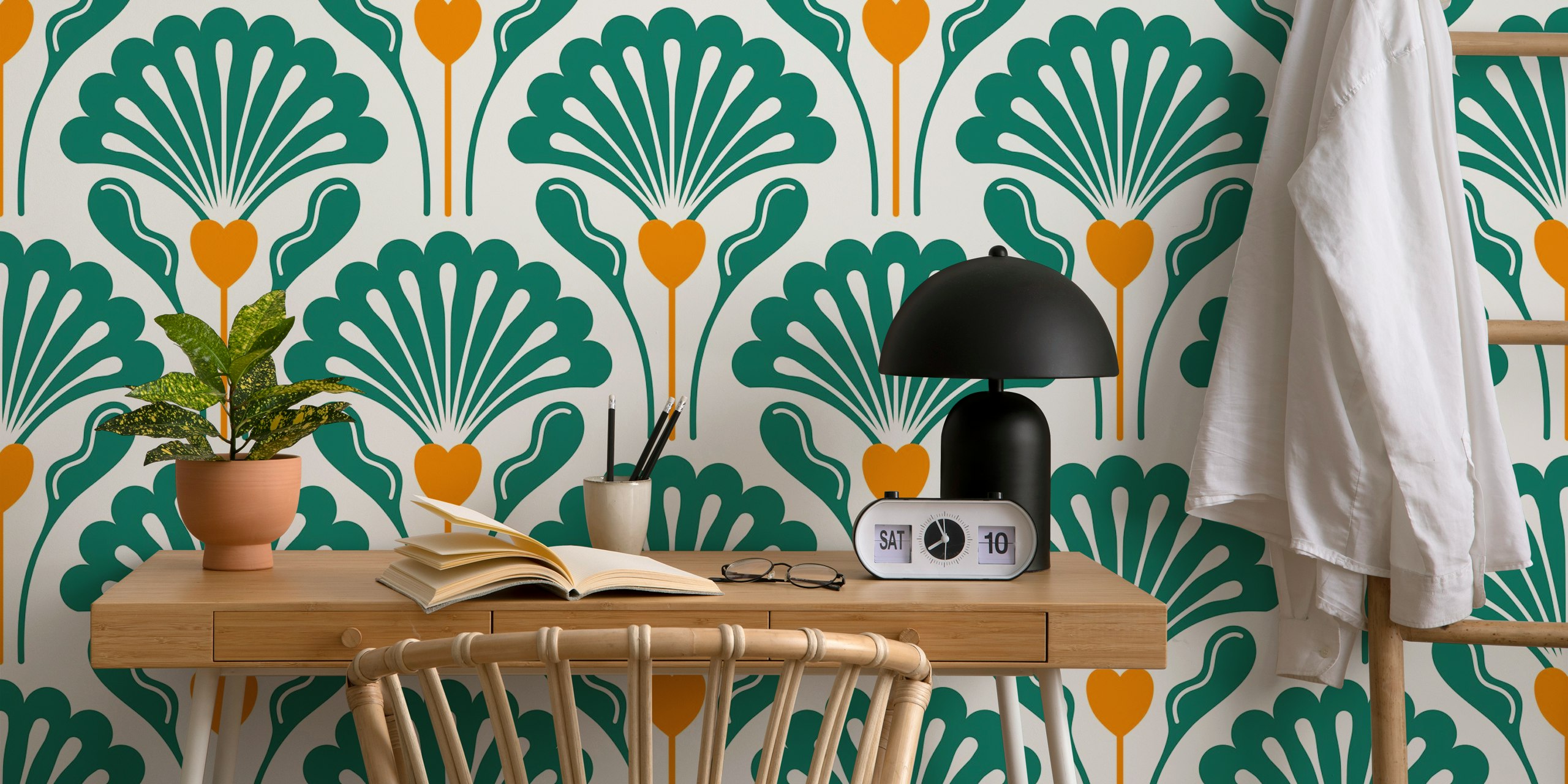 Floral patterns in green and orange on cream wallpaper