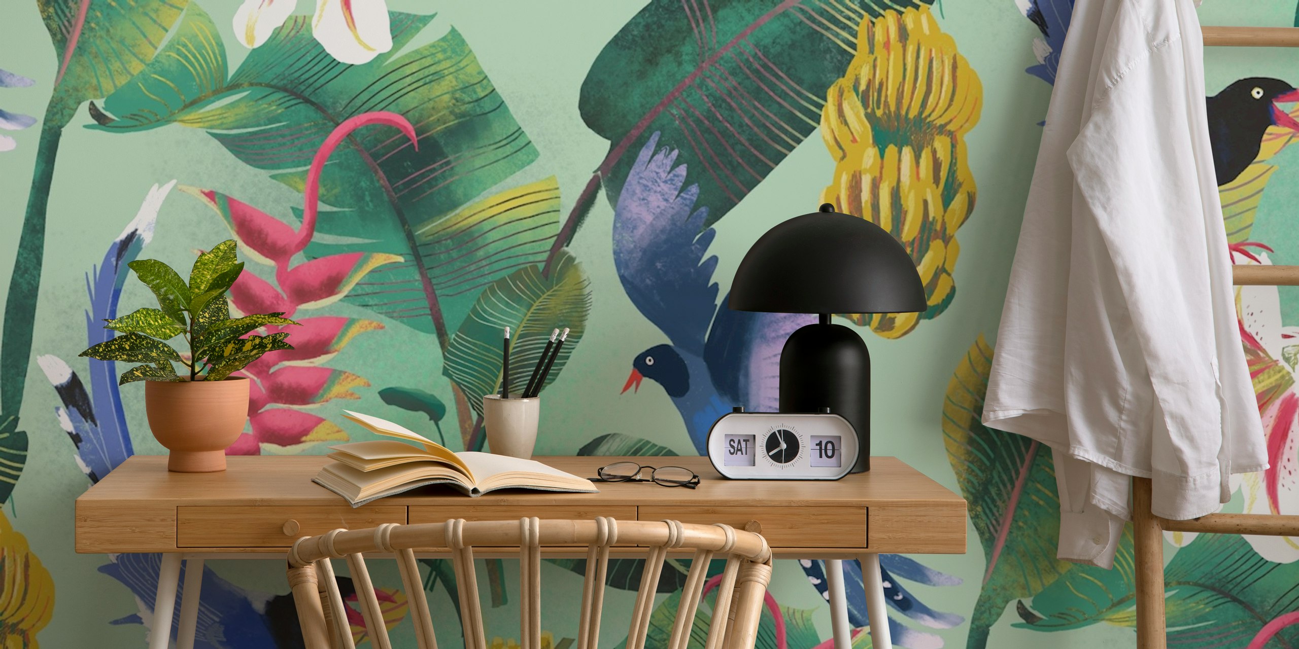 Tropical jungle wallpaper with blue birds, pink flowers, green leaves on a mint background.
