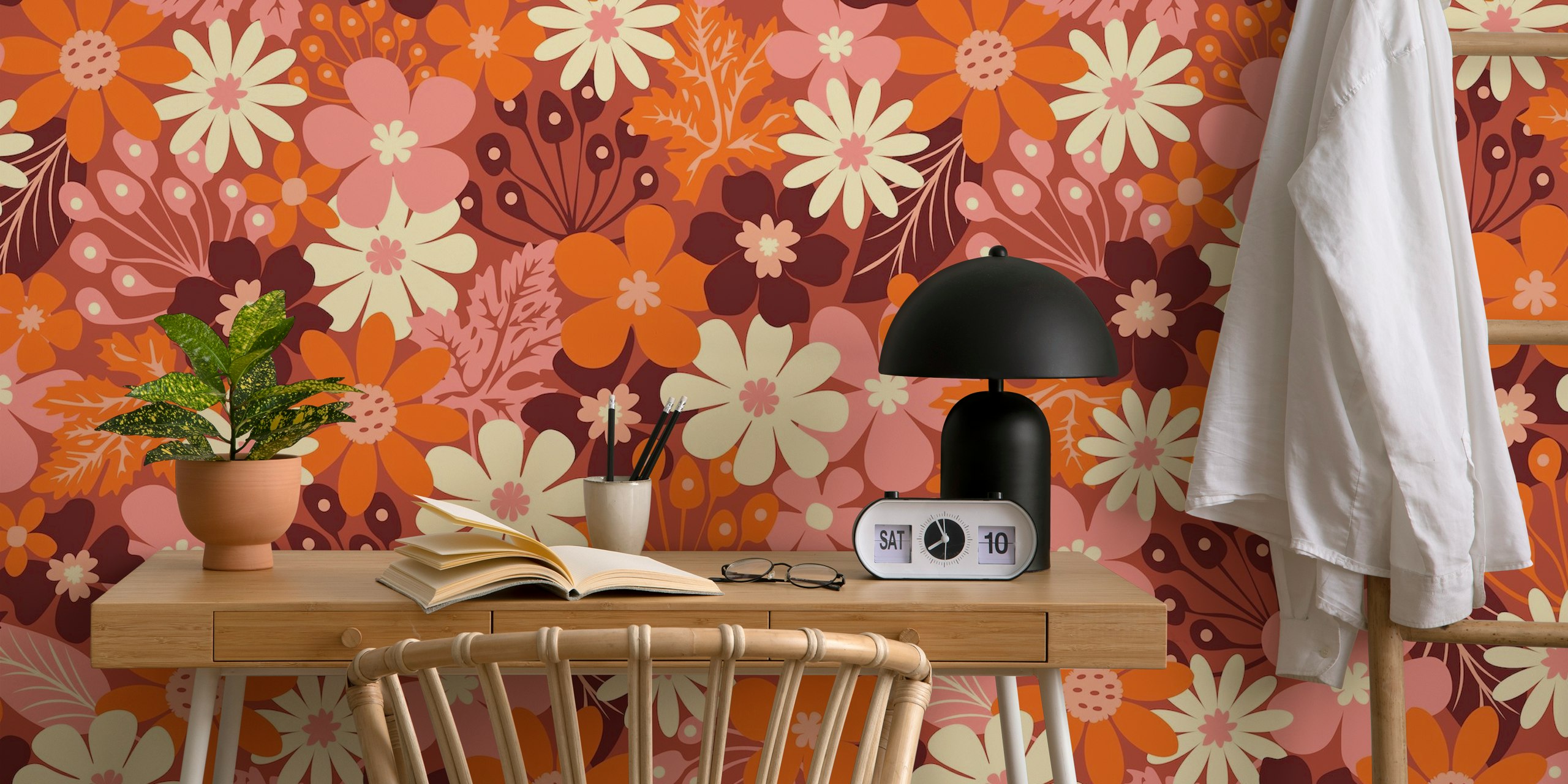 Colorful retro floral design in orange, pink, and cream wallpaper