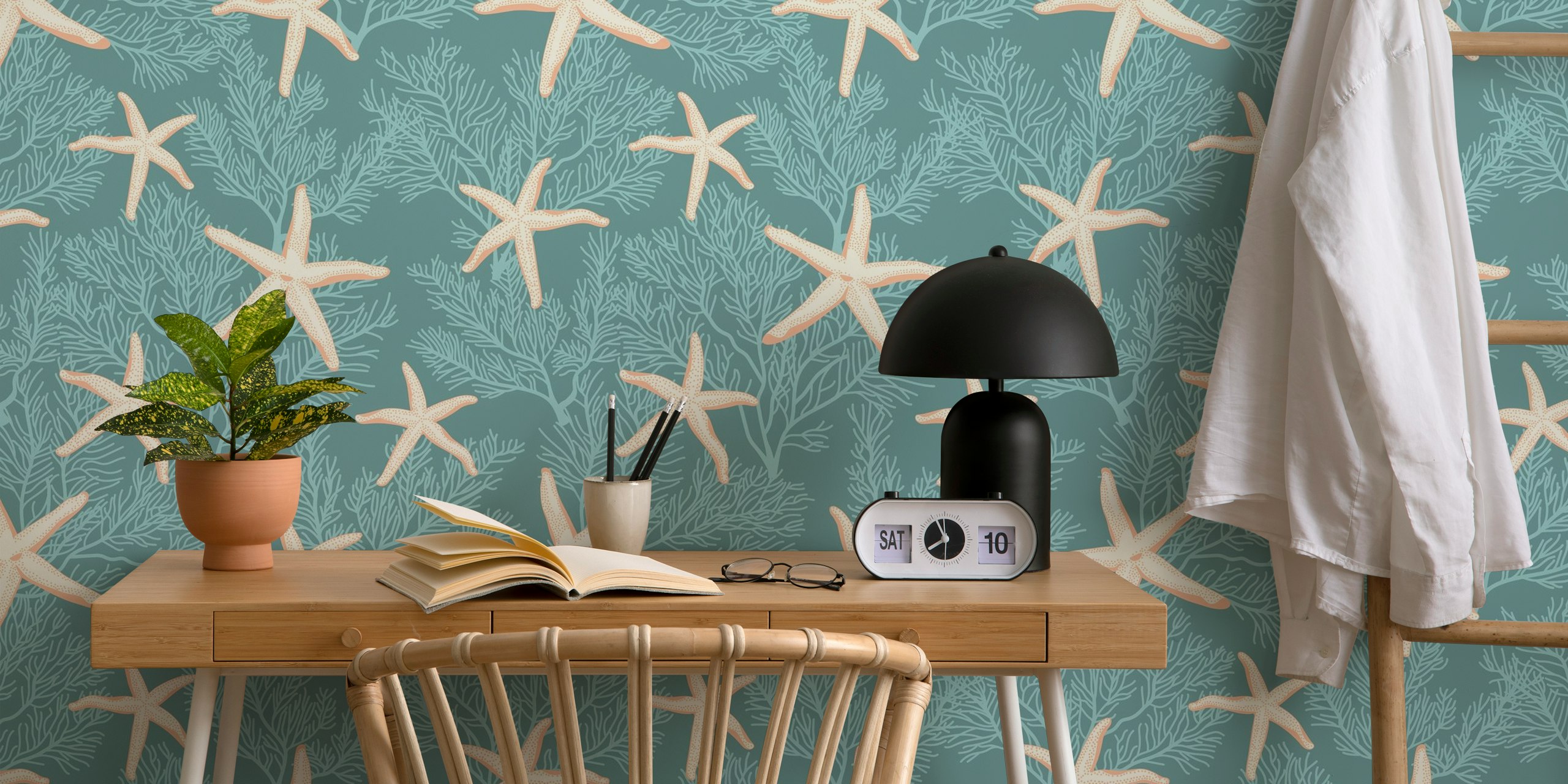 Tropical starfish pattern on light opal green wallpaper