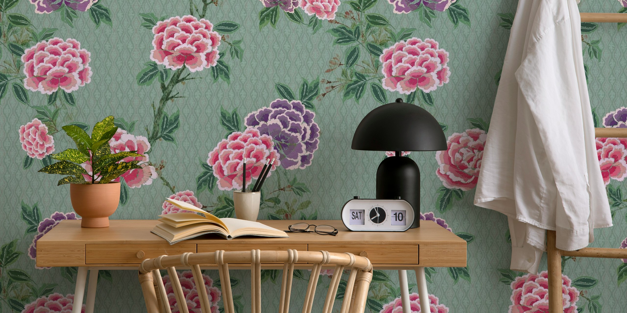 Chinoiserie floral pattern in pink and purple on teal wallpaper