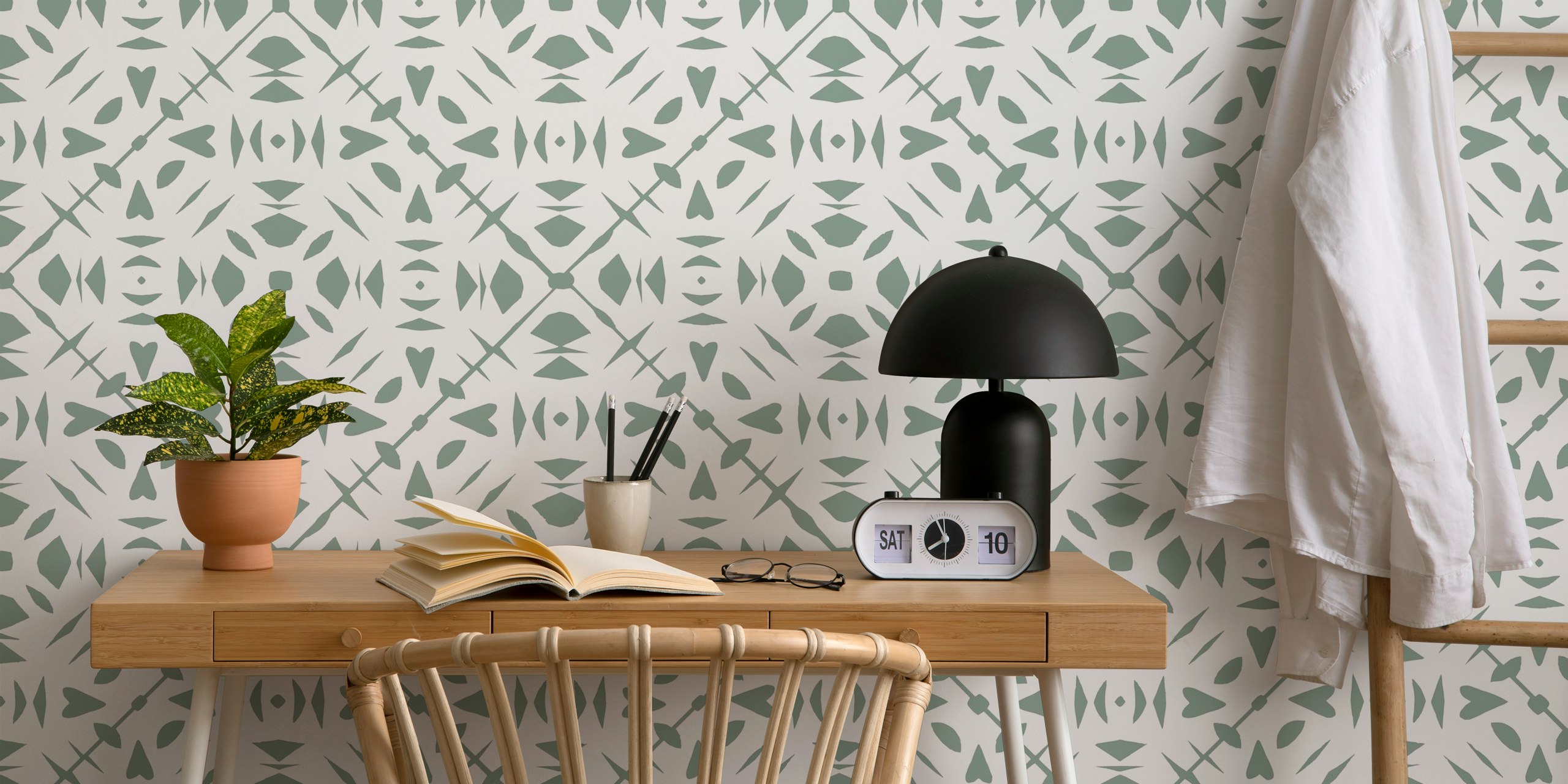 Papercut sage beige wallpaper in a room