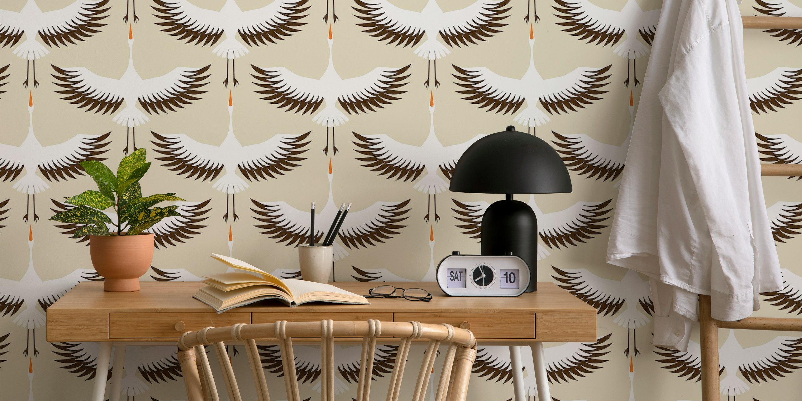 Flying storks wallpaper in a room