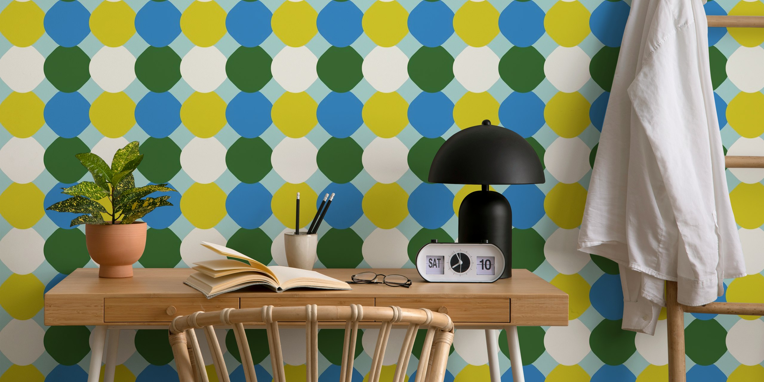 Retro style wall mural with pattern of mint, green, and blue tiles.
