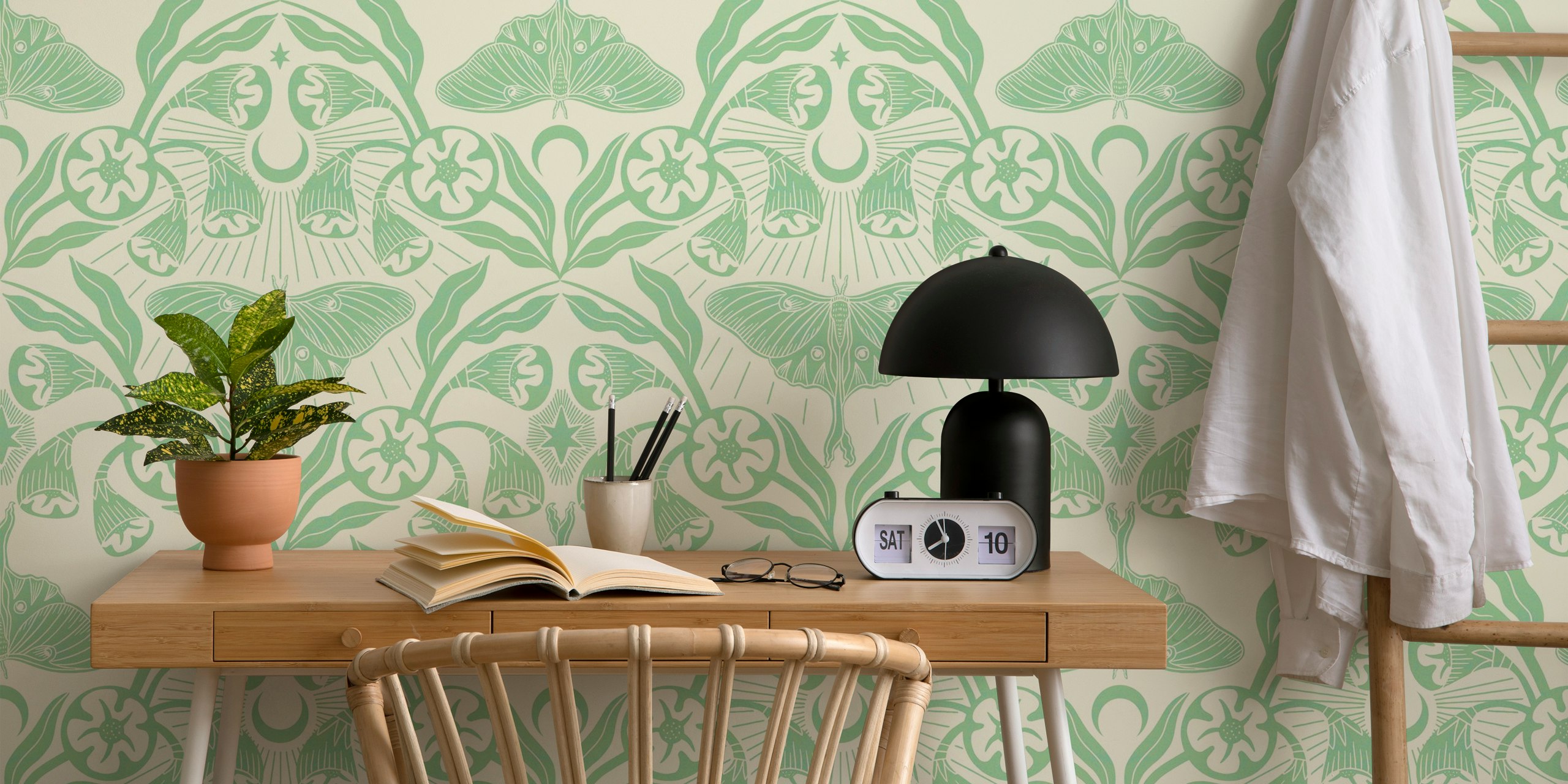 Luna moth and moonflowers in green floral wallpaper