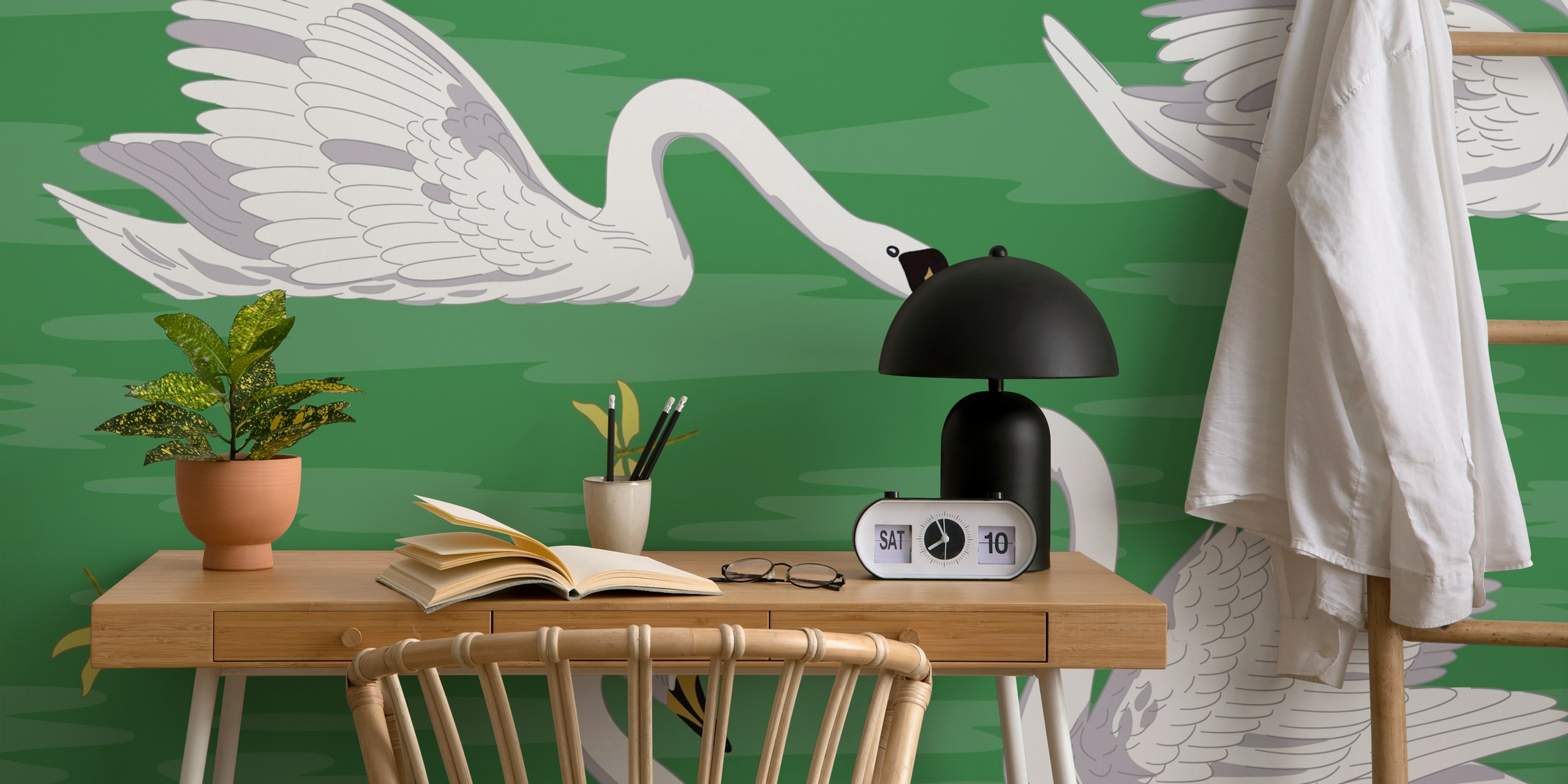 White swans wallpaper displayed in a room