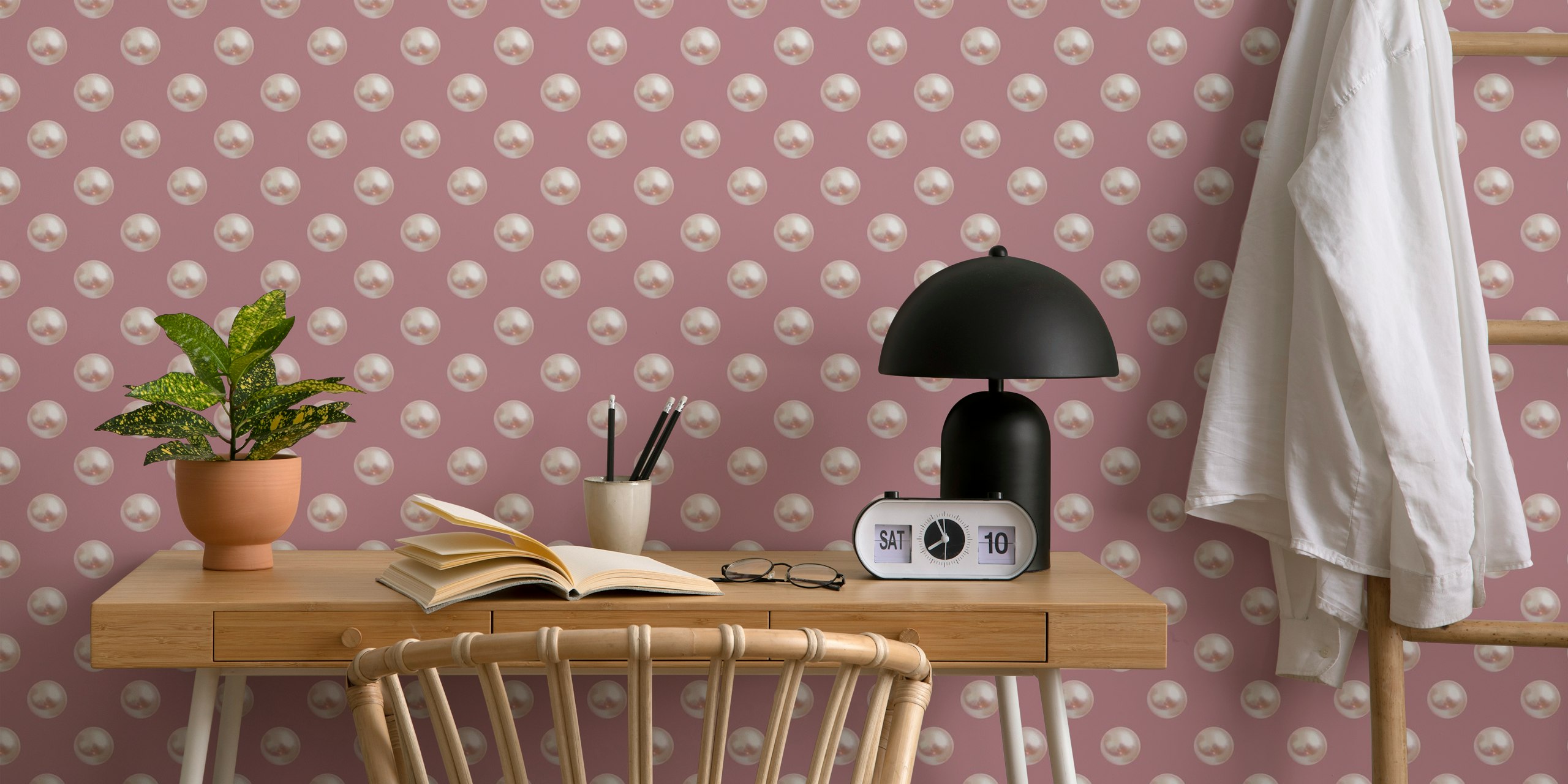 Pink background with white pearl polka dots wallpaper
