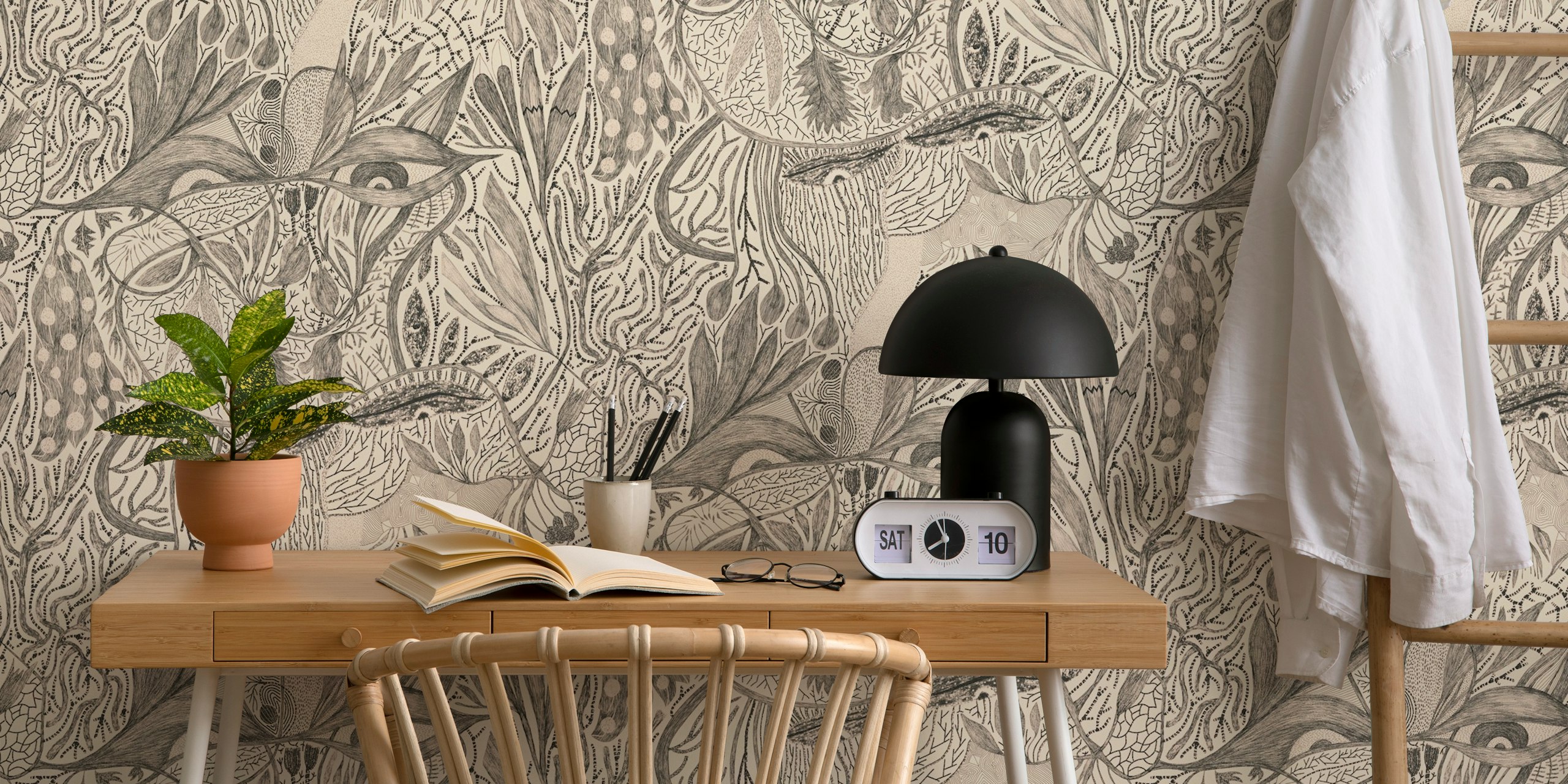 Intricate neutral abstract patterns in black and beige wallpaper