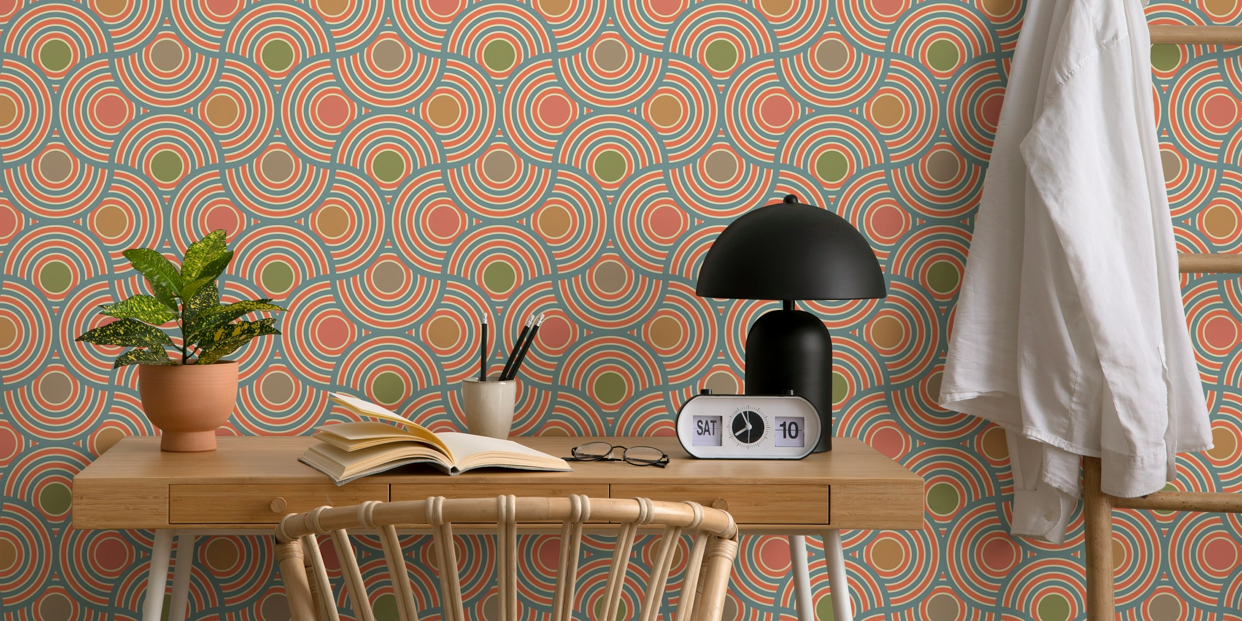 Art Deco geometric circle wallpaper in coral, teal, and beige.