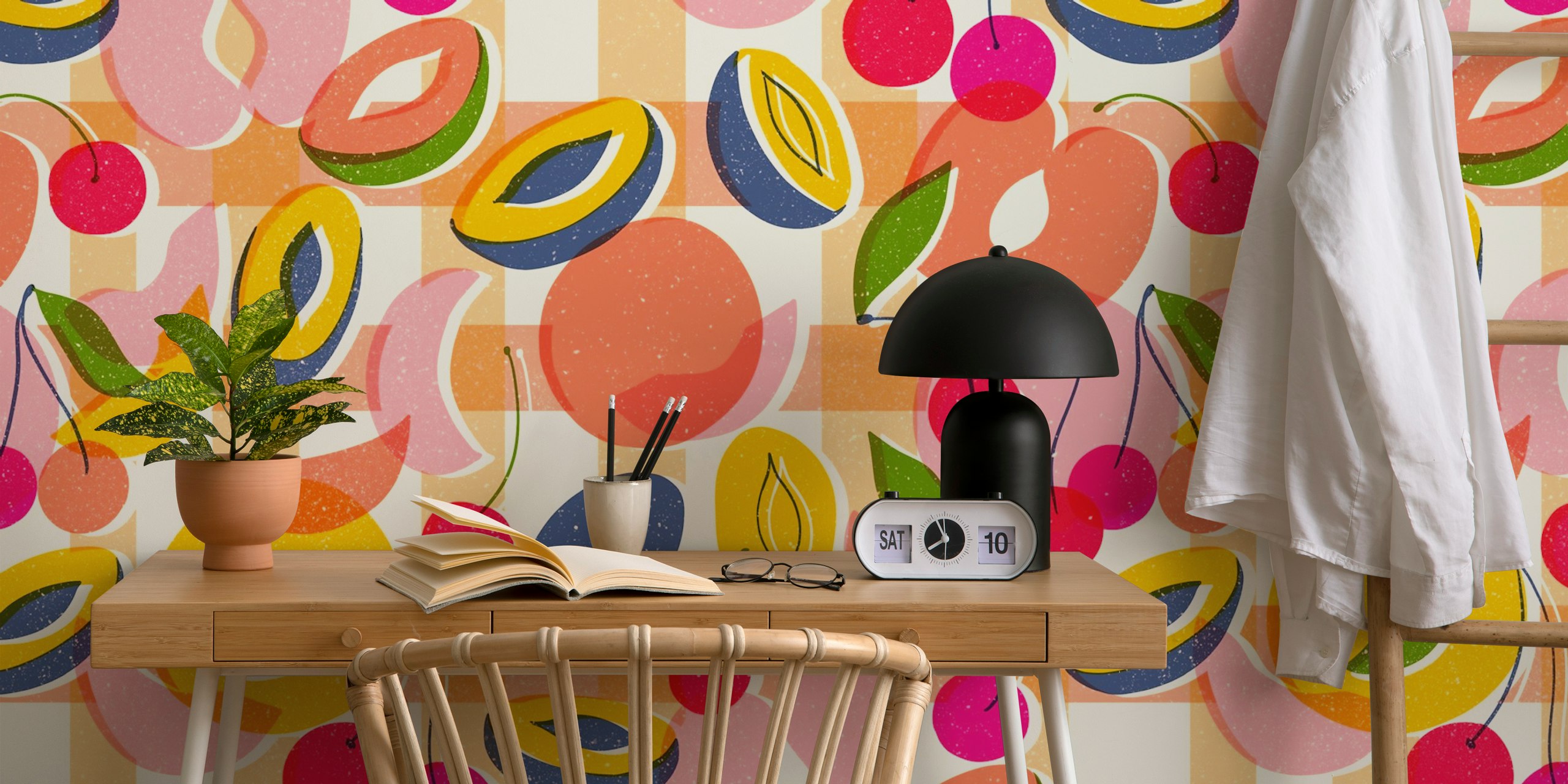 Colorful fruit shapes and patterns in pink, yellow, and green wallpaper