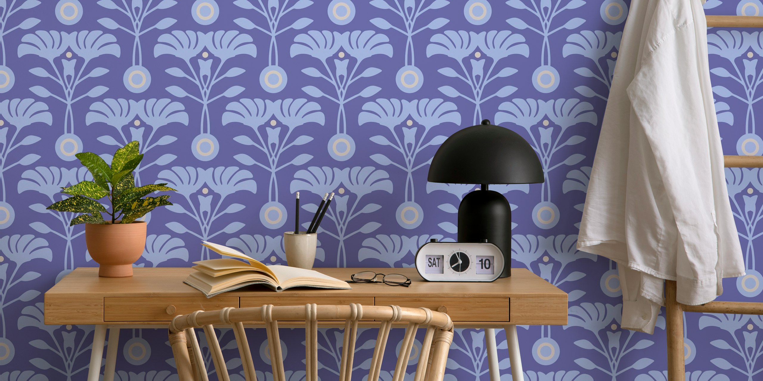 Floral patterns in purple and light blue on wallpaper