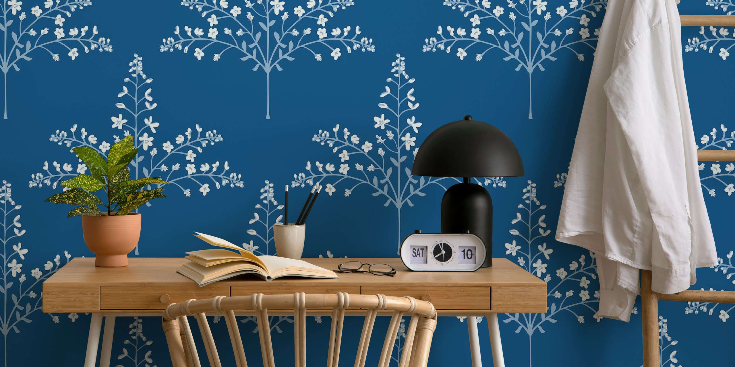 Blue And White Floral Wallpaper In A Room