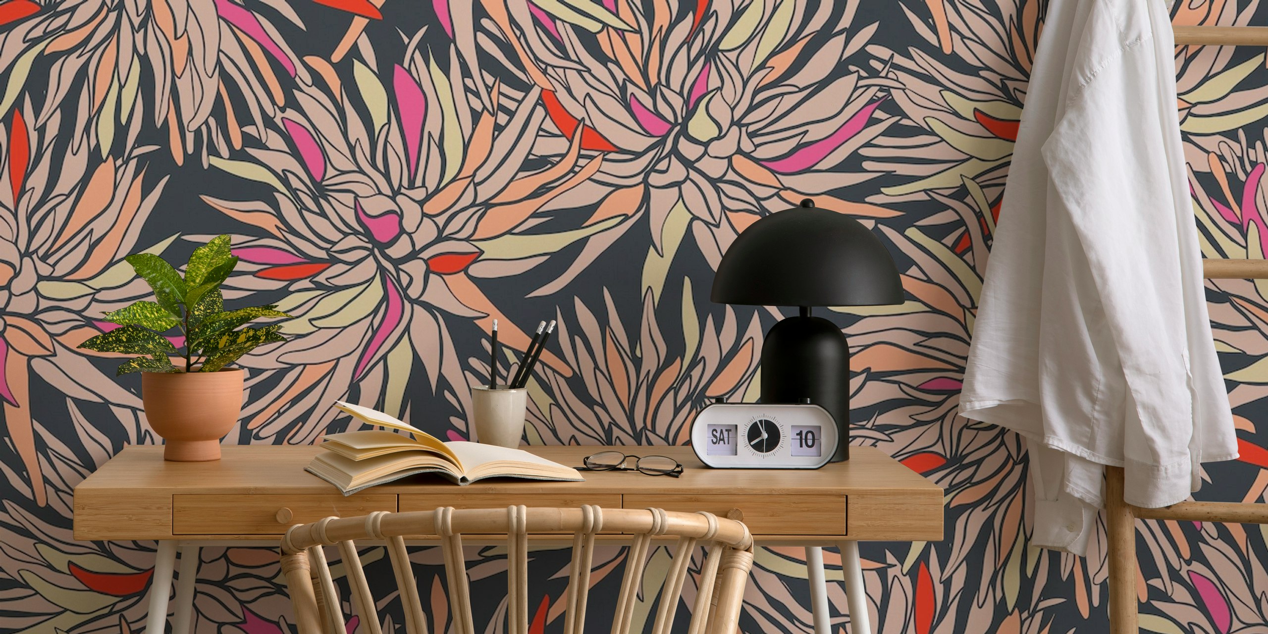 Repeating dahlia flowers in pink, orange, and cream on a dark background wallpaper