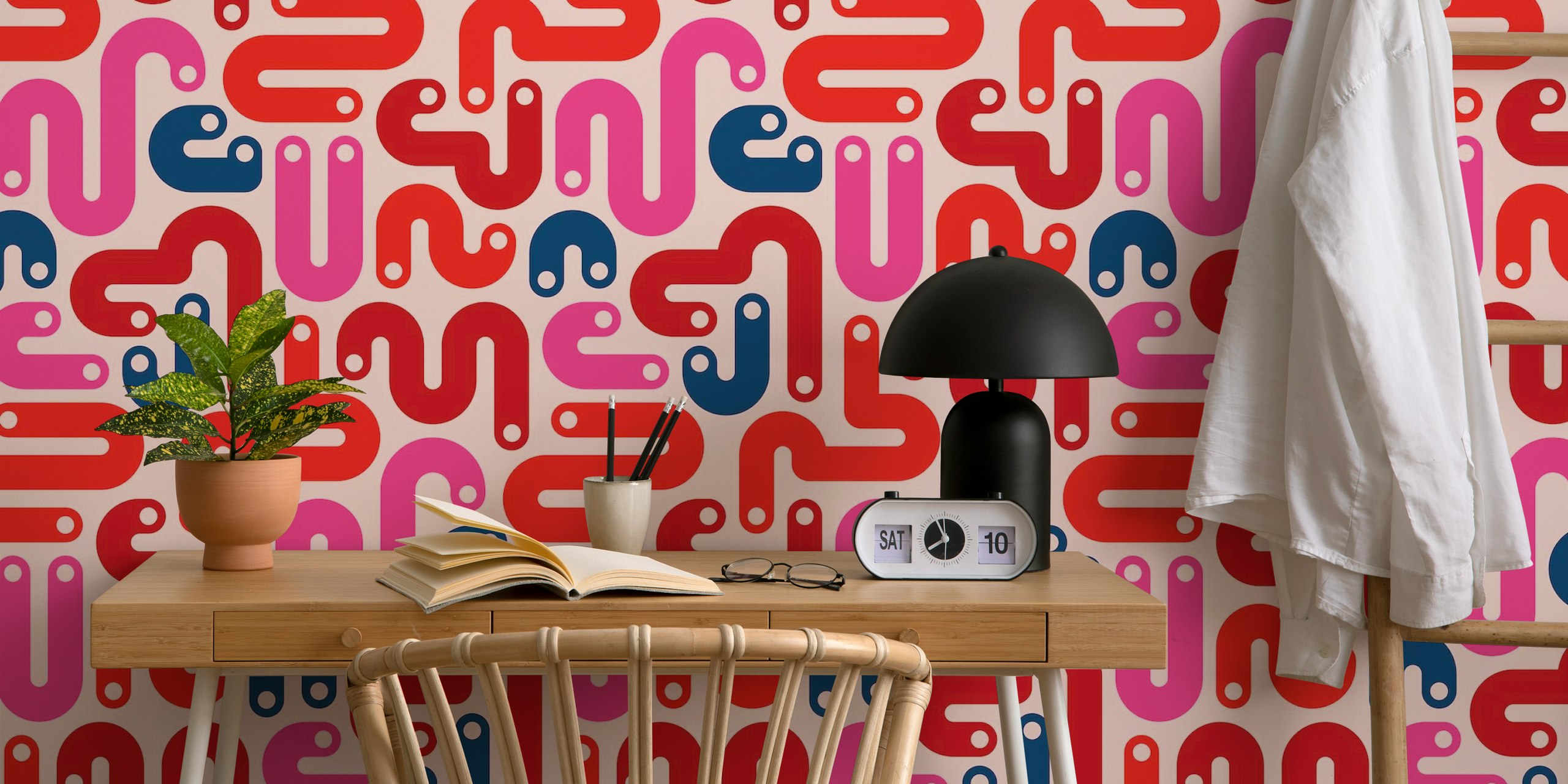 80s-style abstract mural with curvy red and pink shapes