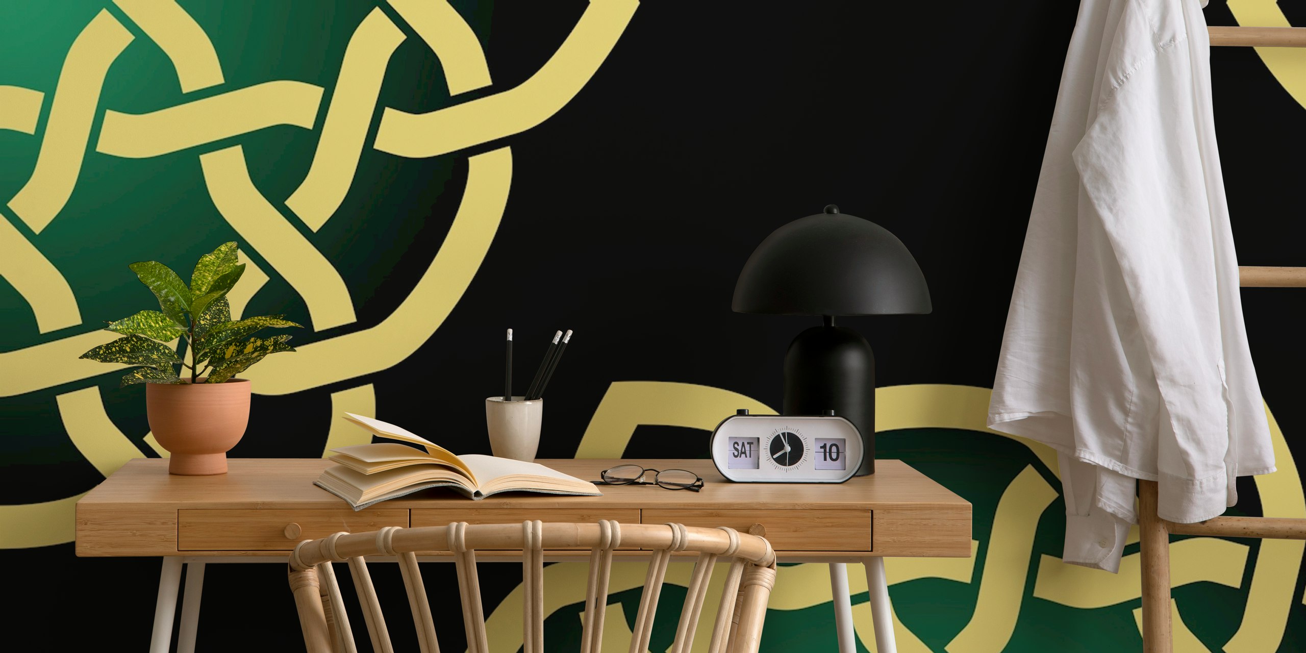 Gold and green Celtic knot pattern on black wallpaper