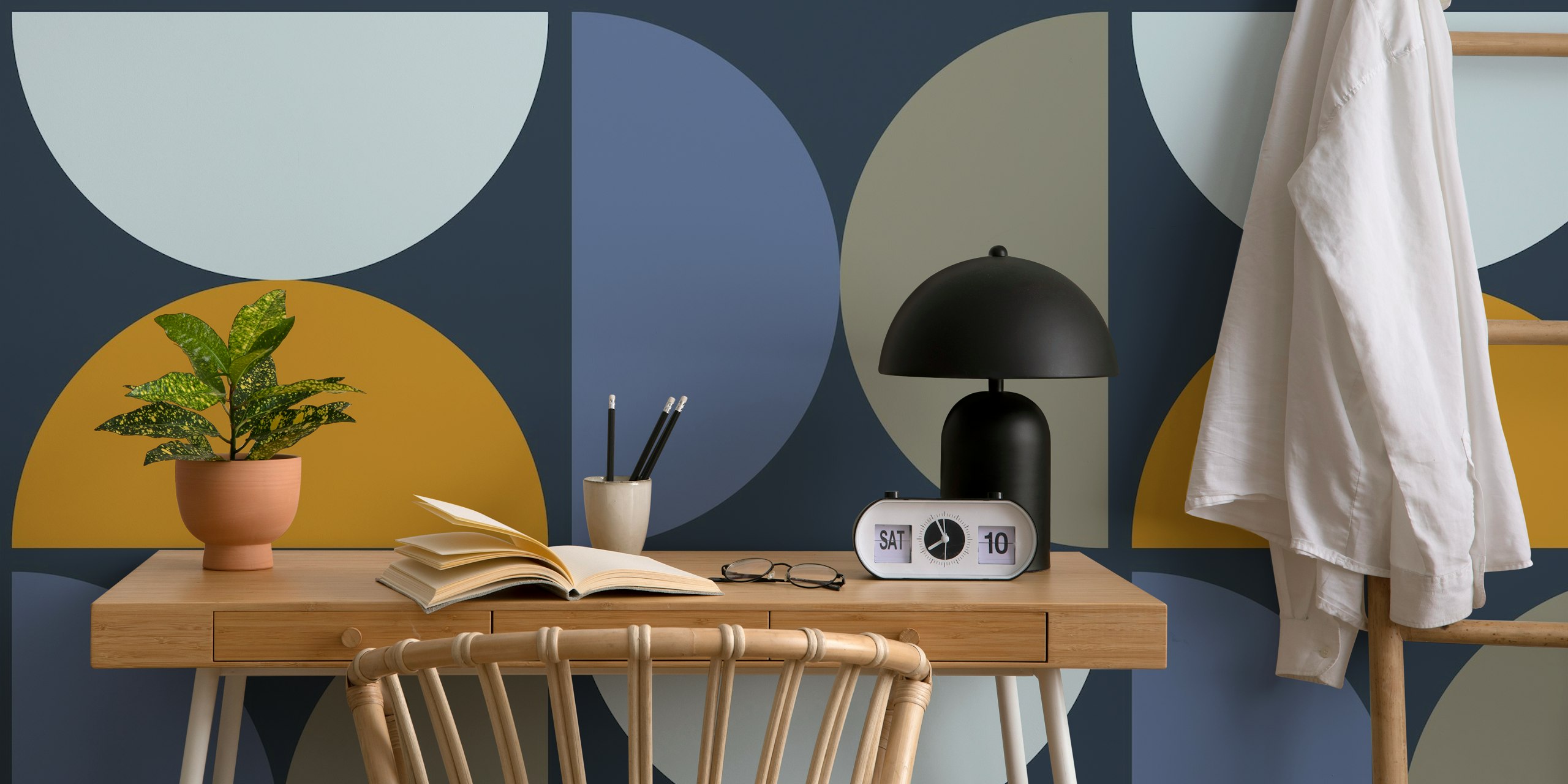 Geometric semicircles in blue, gold, and gray wallpaper