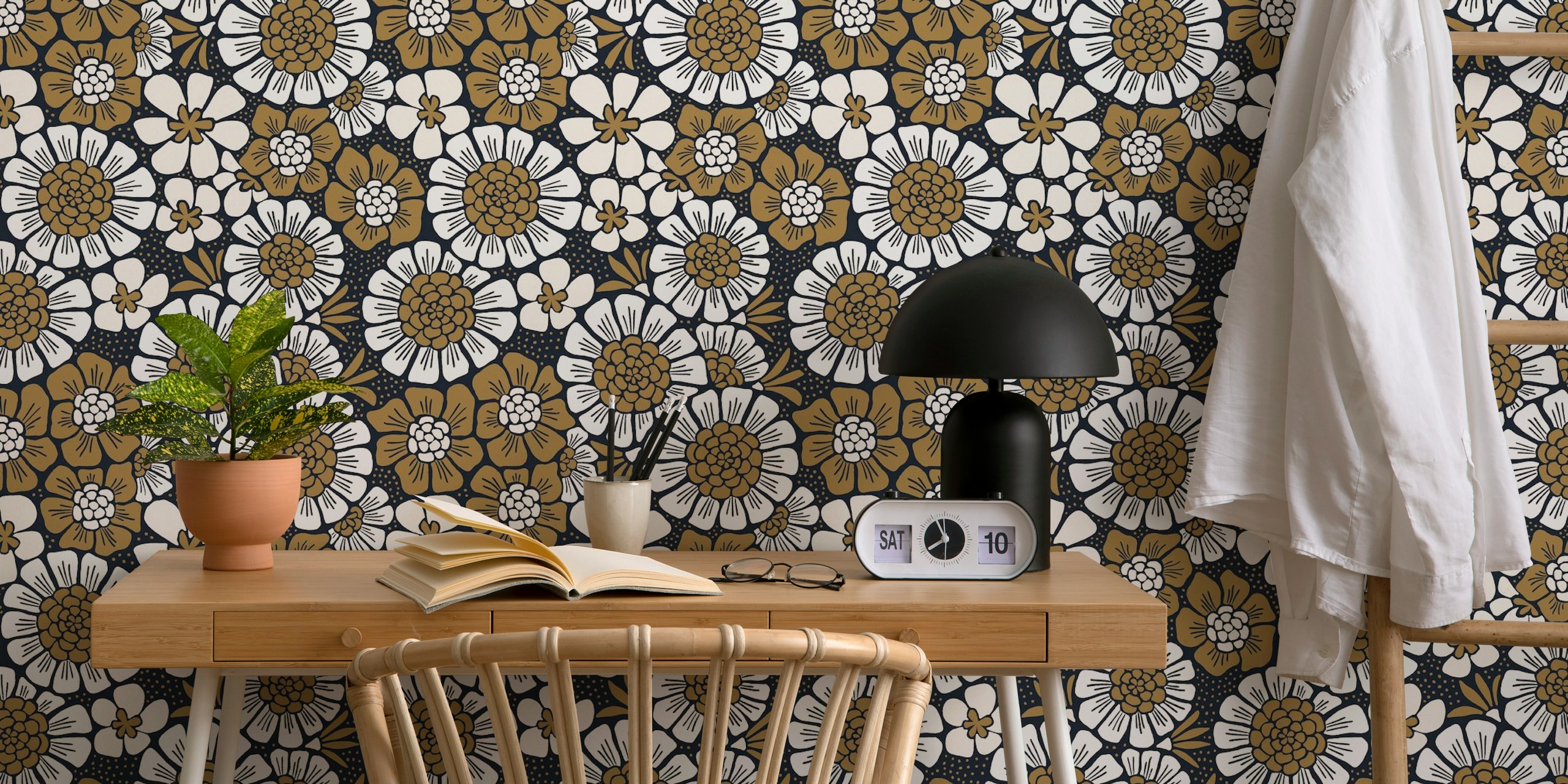 Black and gold floral pattern wallpaper featuring various flowers on a dark background