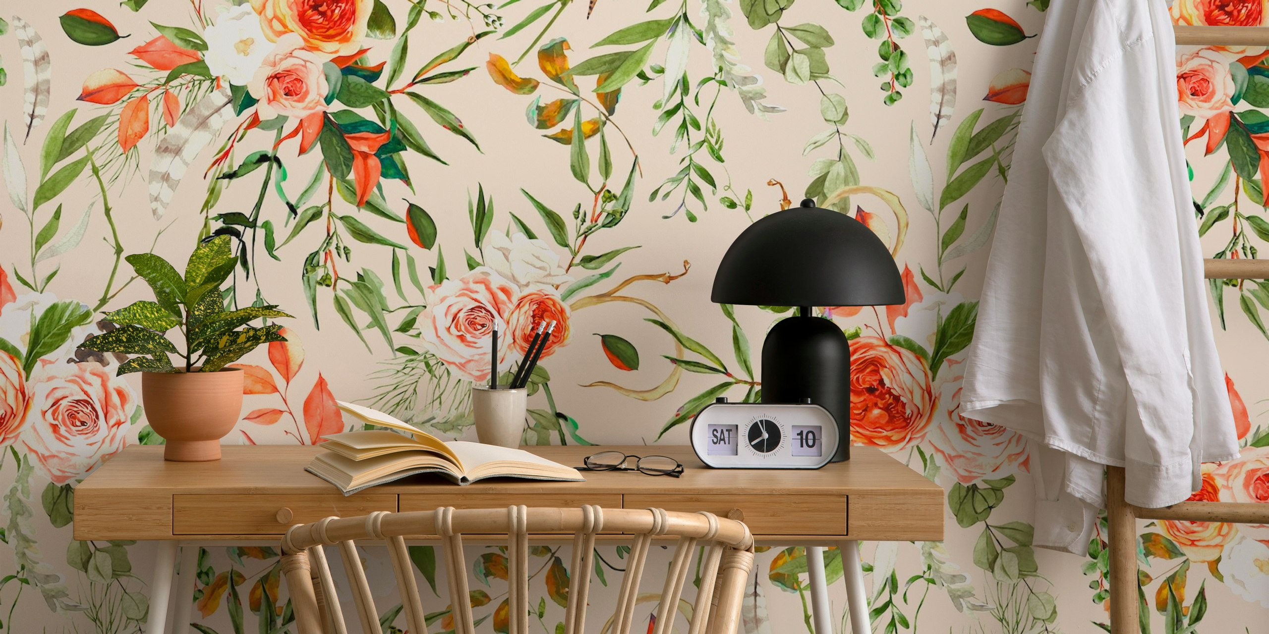 Floral wallpaper with soft peach roses, green leaves, and decorative feathers
