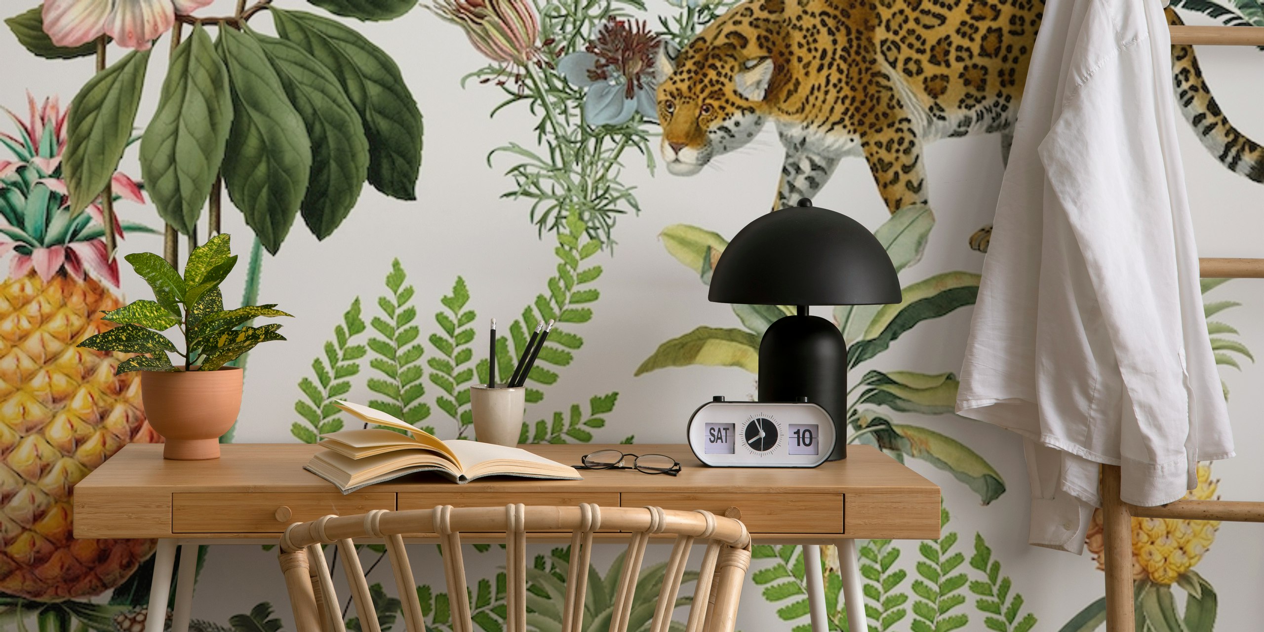 Tropical animal print wallpaper with leopards, pineapples, and ferns