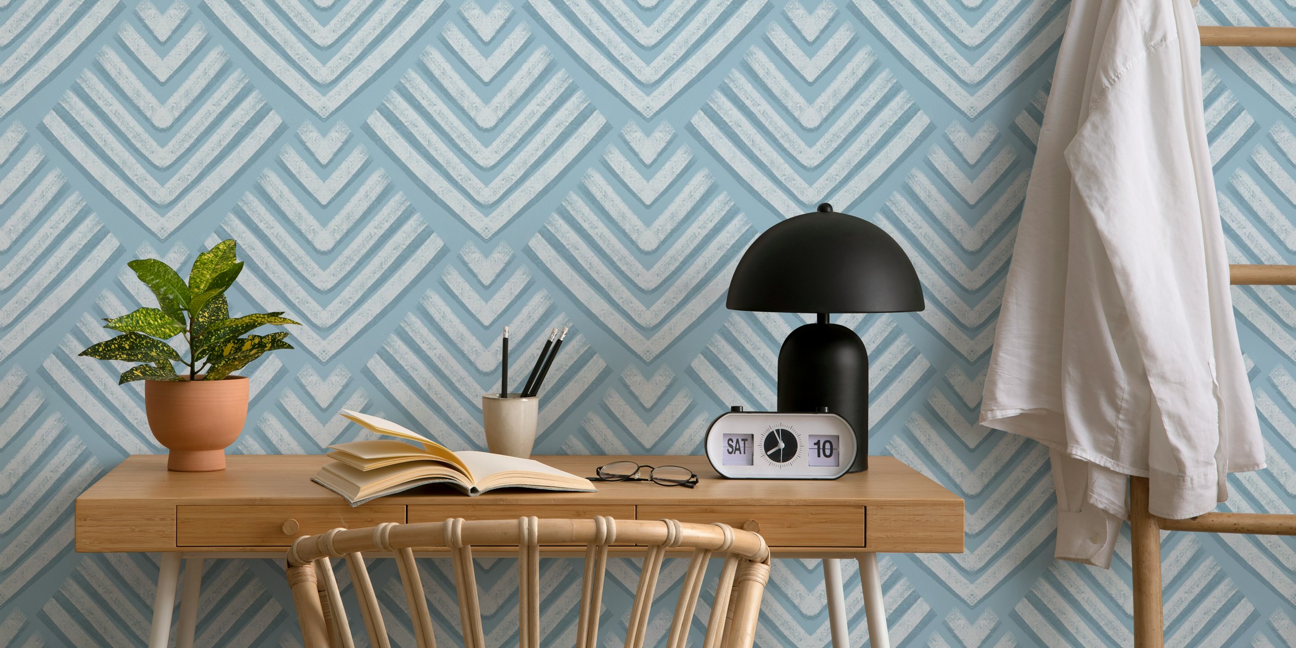 Light blue geometric chevron patterns wallpaper