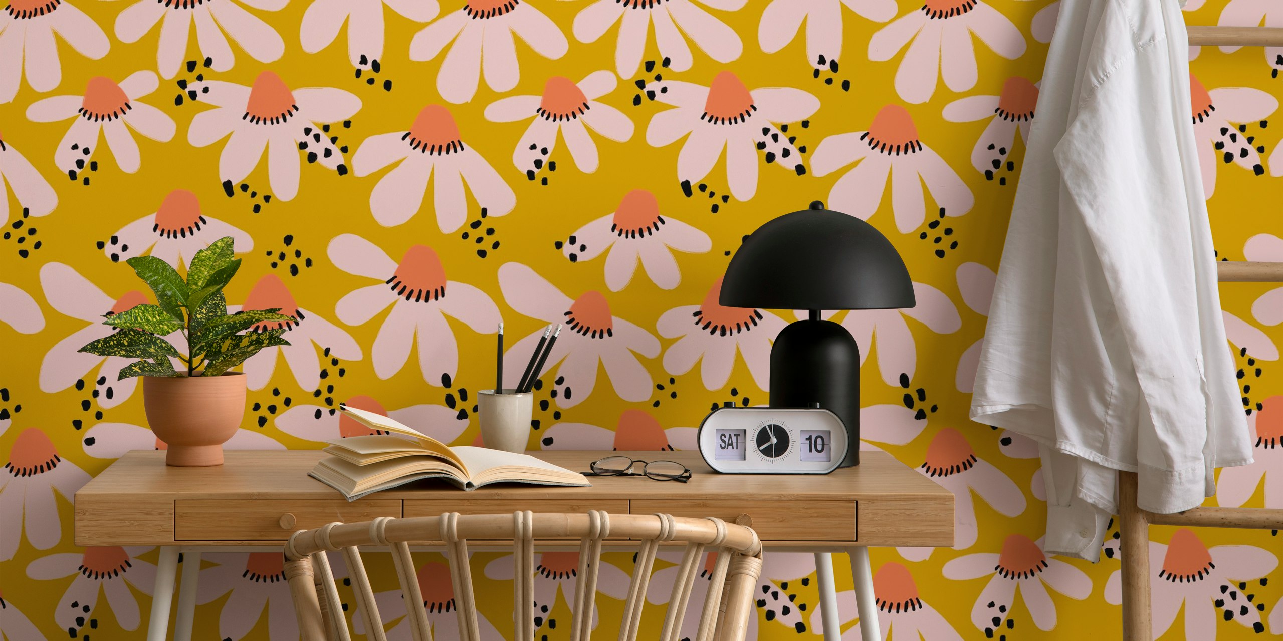 Pink flowers with peach centers and black dots wallpaper