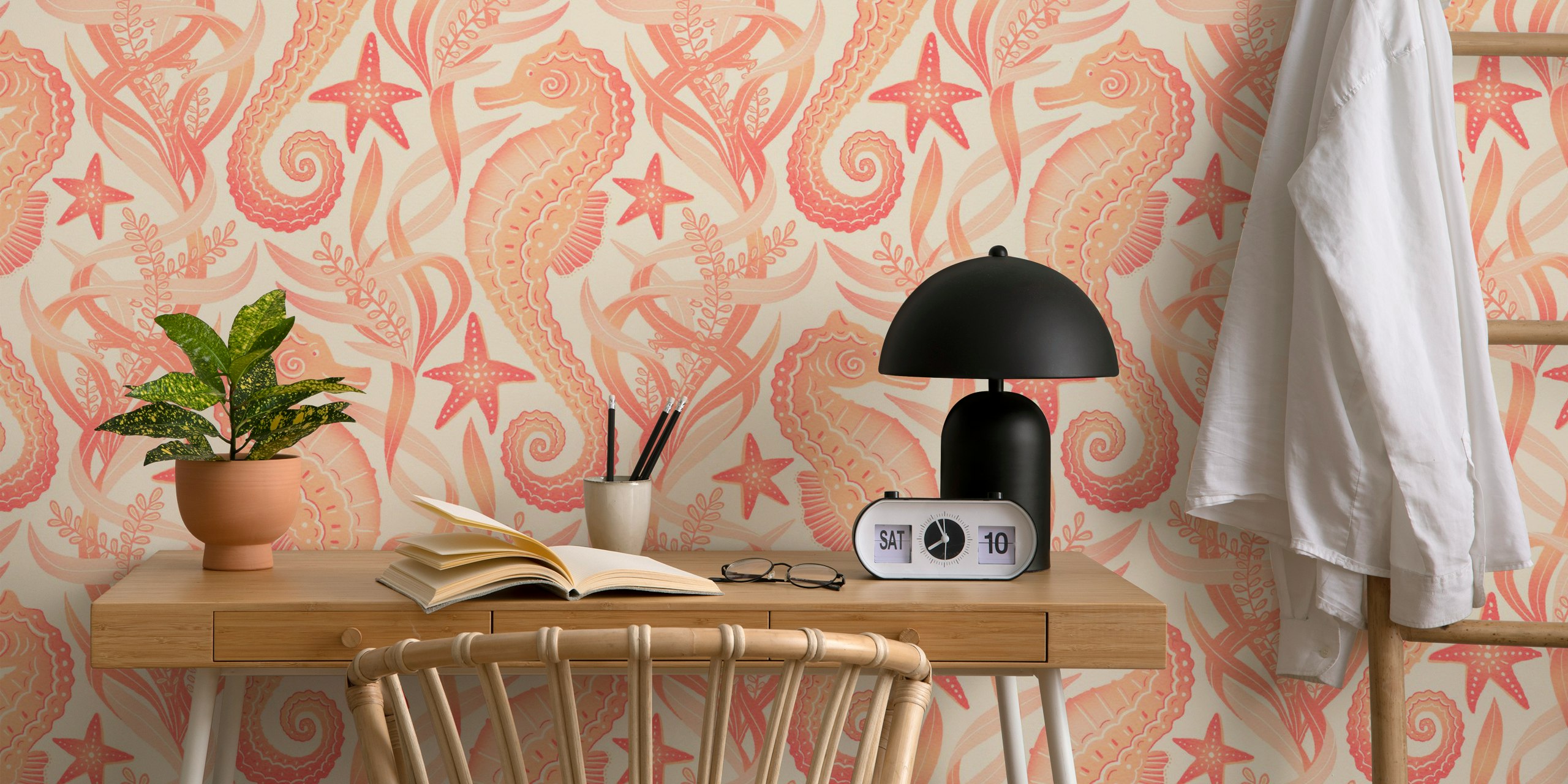 Decorazione murale con dolci cavallucci marini e stelle marine su sfondo color pesca