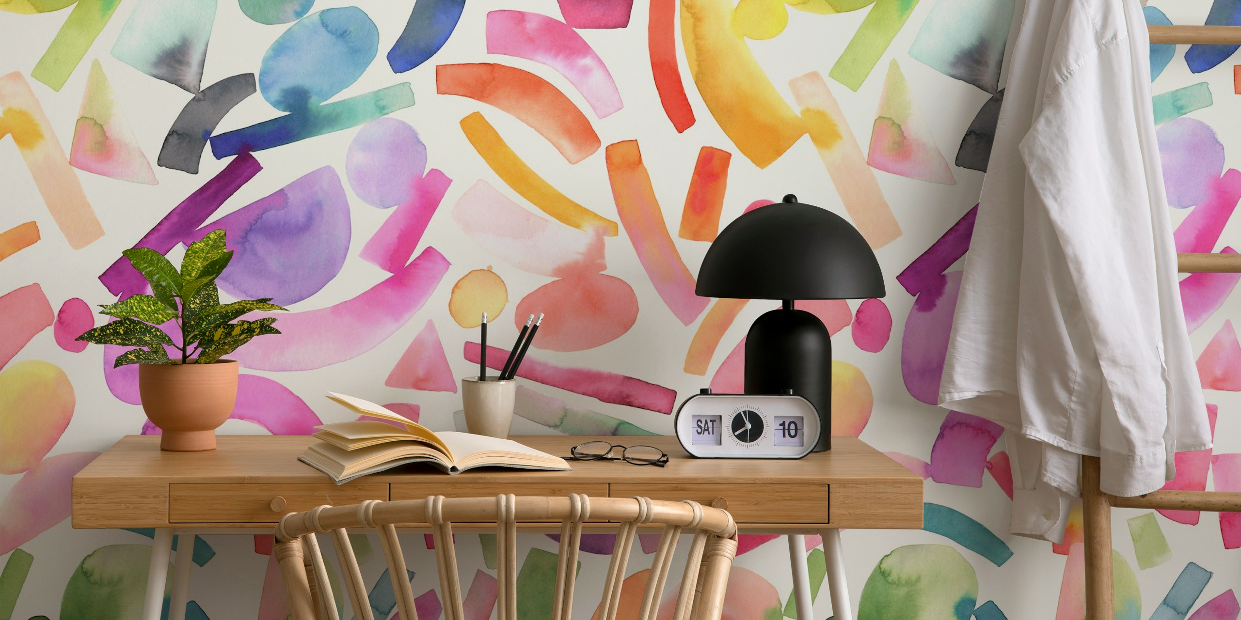 Colorful geometric shapes including pink, green, and blue pattern wallpaper