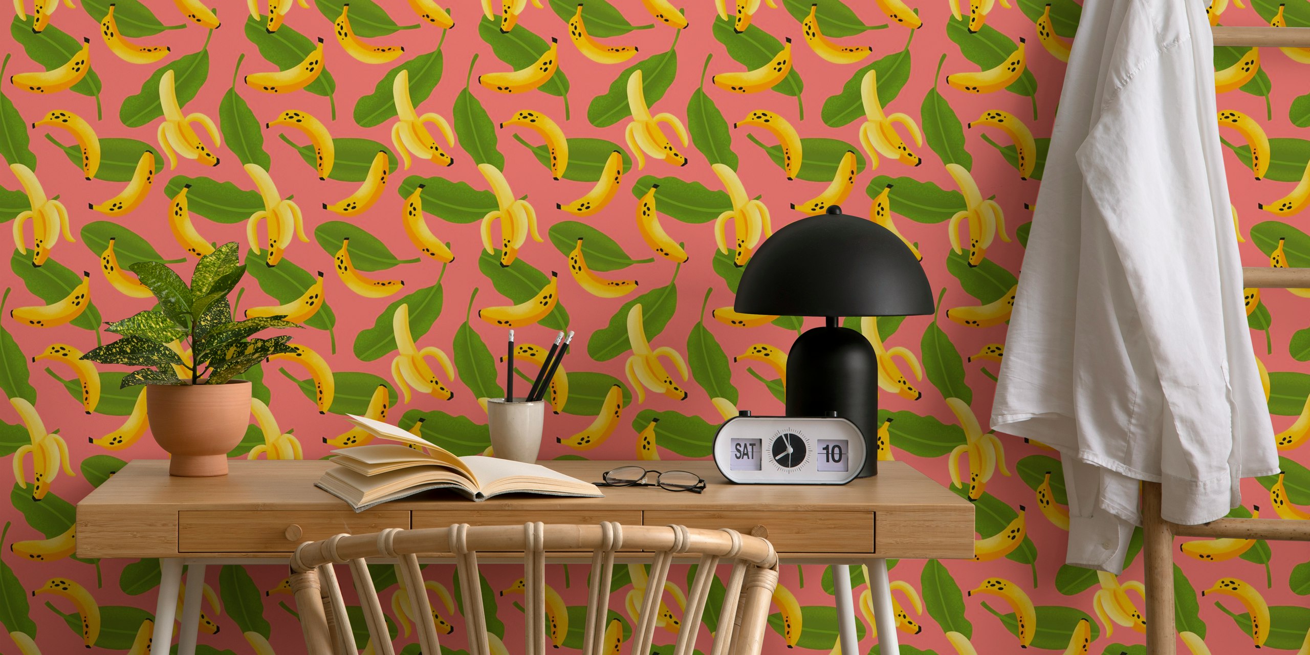Banana pattern wallpaper on pink background