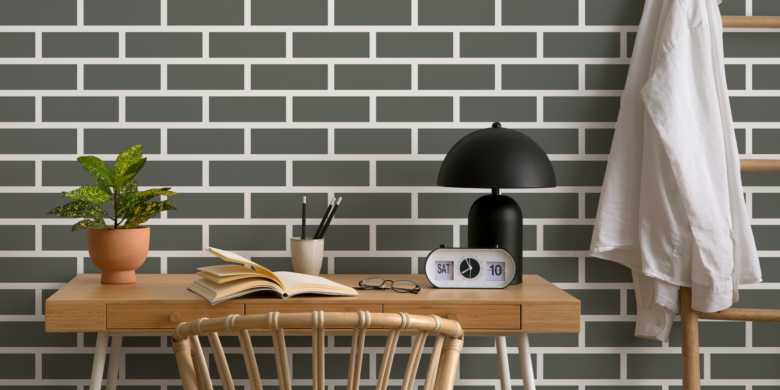 Dark grey brick pattern wallpaper showing textured bricks