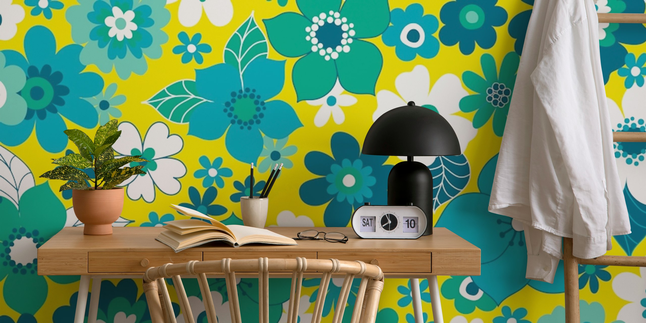 Teal, turquoise, and white floral patterns on yellow wallpaper