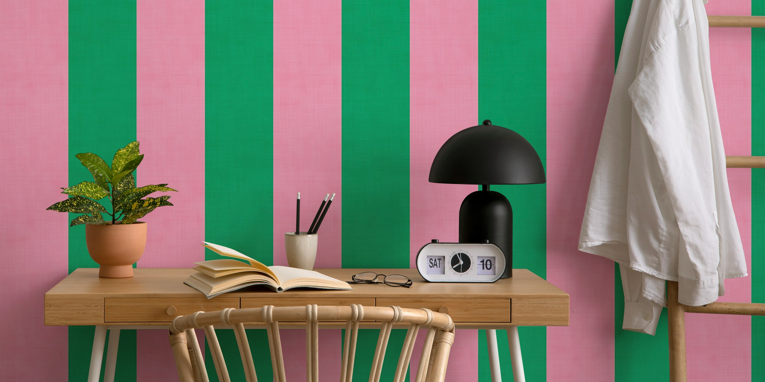 Bright pink and green stripes wallpaper in a room