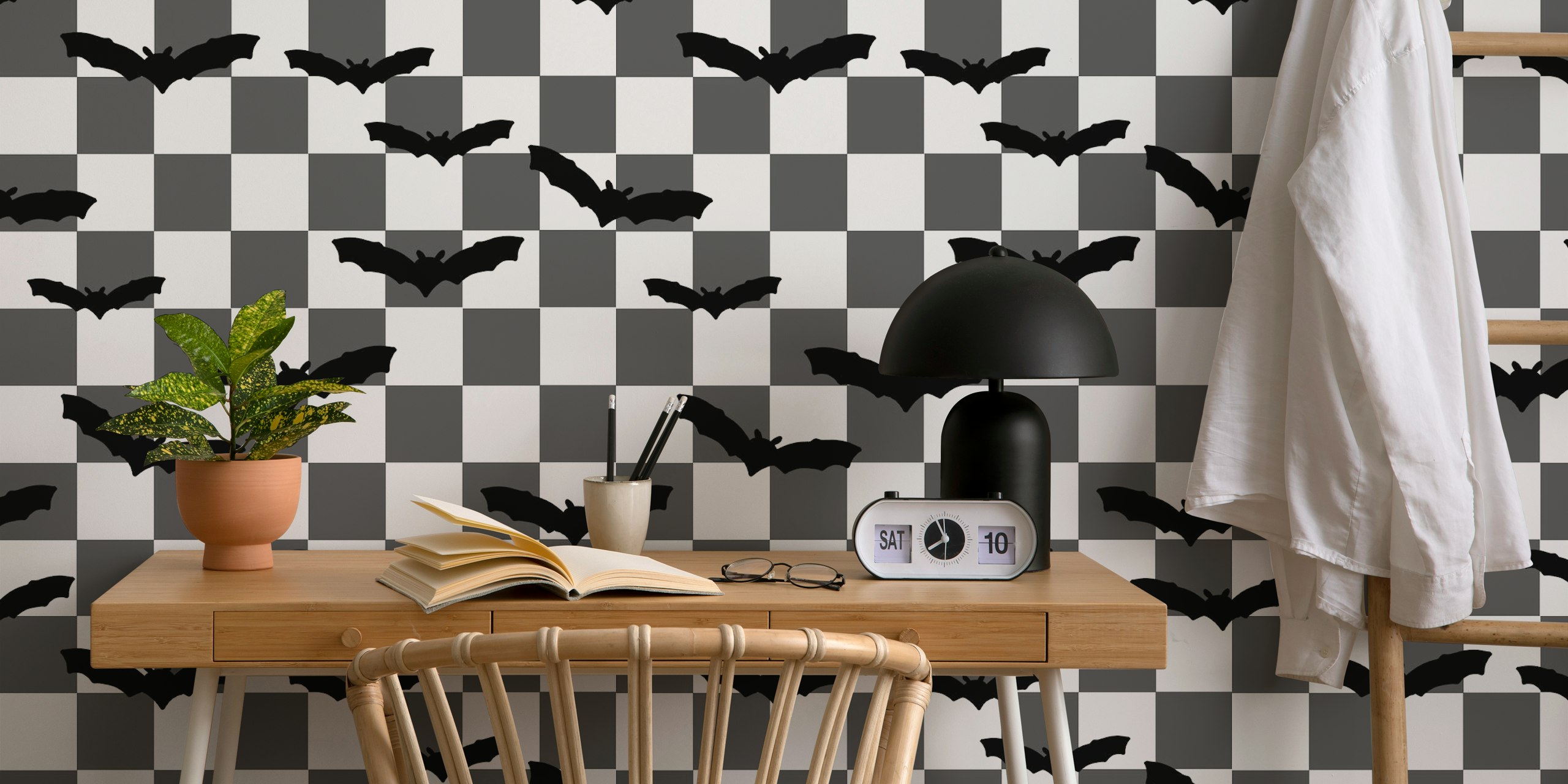 Black bats on grey checkerboard wallpaper design